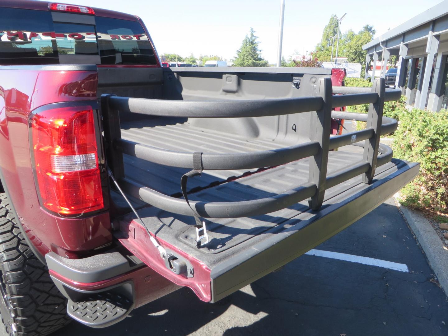 2016 Crimson Red /BLACK GMC Sierra 2500 HD Crew Cab (1GT12UE81GF) with an V8 Turbo Dsl 6.6L engine, Auto 6-Spd Allison OD transmission, located at 2630 Grass Valley Highway, Auburn, CA, 95603, (530) 508-5100, 38.937893, -121.095482 - BDS suspension, Fox Shocks, SOTA Novkane wheels, Nitto Ridge Grappler tires, AMP bed extender, and Husky Floor liners. - Photo#11