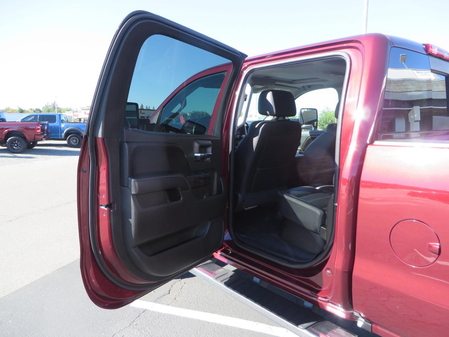 2016 Crimson Red /BLACK GMC Sierra 2500 HD Crew Cab (1GT12UE81GF) with an V8 Turbo Dsl 6.6L engine, Auto 6-Spd Allison OD transmission, located at 2630 Grass Valley Highway, Auburn, CA, 95603, (530) 508-5100, 38.937893, -121.095482 - BDS suspension, Fox Shocks, SOTA Novkane wheels, Nitto Ridge Grappler tires, AMP bed extender, and Husky Floor liners. - Photo#28