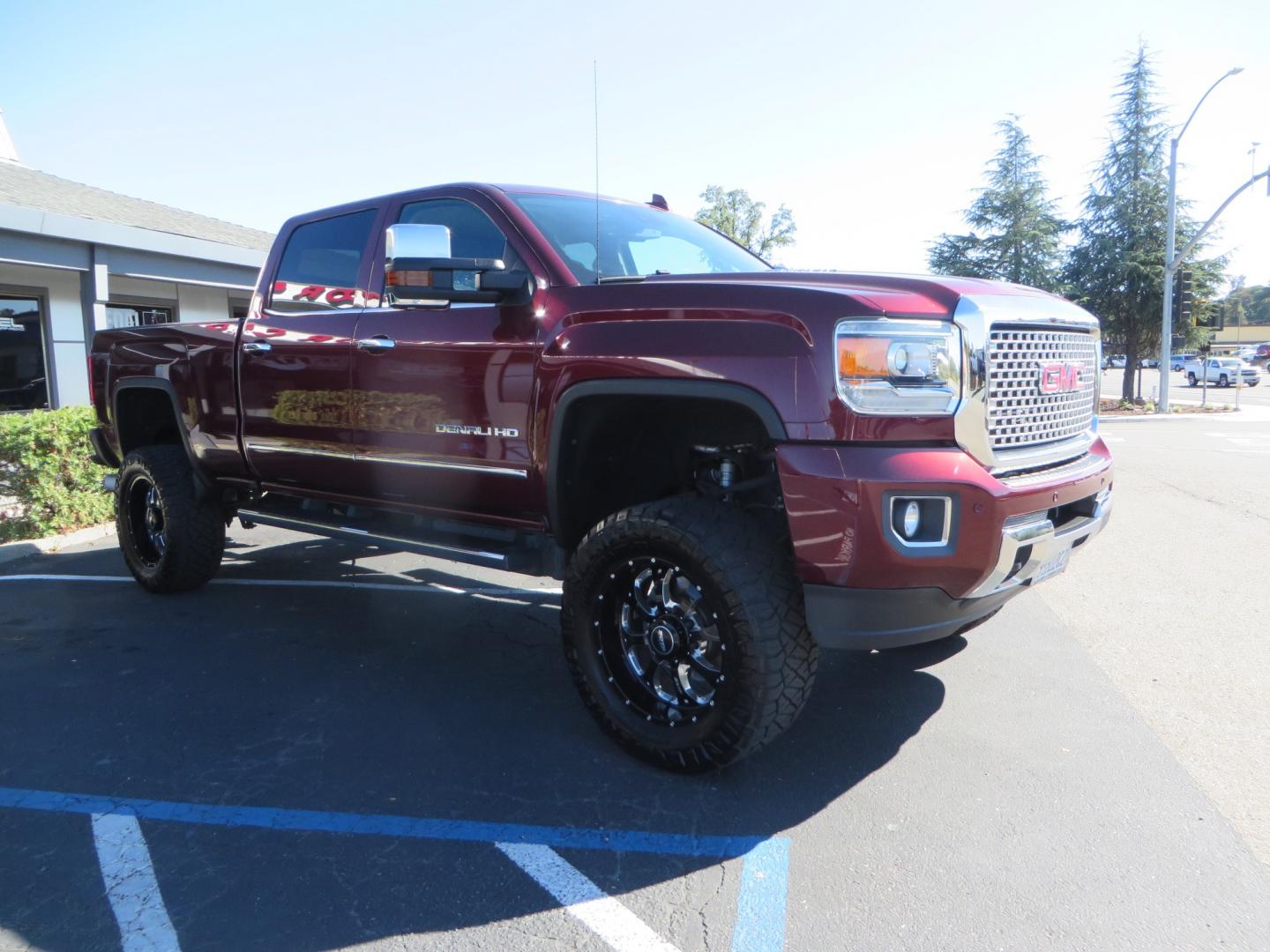 2016 Crimson Red /BLACK GMC Sierra 2500 HD Crew Cab (1GT12UE81GF) with an V8 Turbo Dsl 6.6L engine, Auto 6-Spd Allison OD transmission, located at 2630 Grass Valley Highway, Auburn, CA, 95603, (530) 508-5100, 38.937893, -121.095482 - BDS suspension, Fox Shocks, SOTA Novkane wheels, Nitto Ridge Grappler tires, AMP bed extender, and Husky Floor liners. - Photo#2