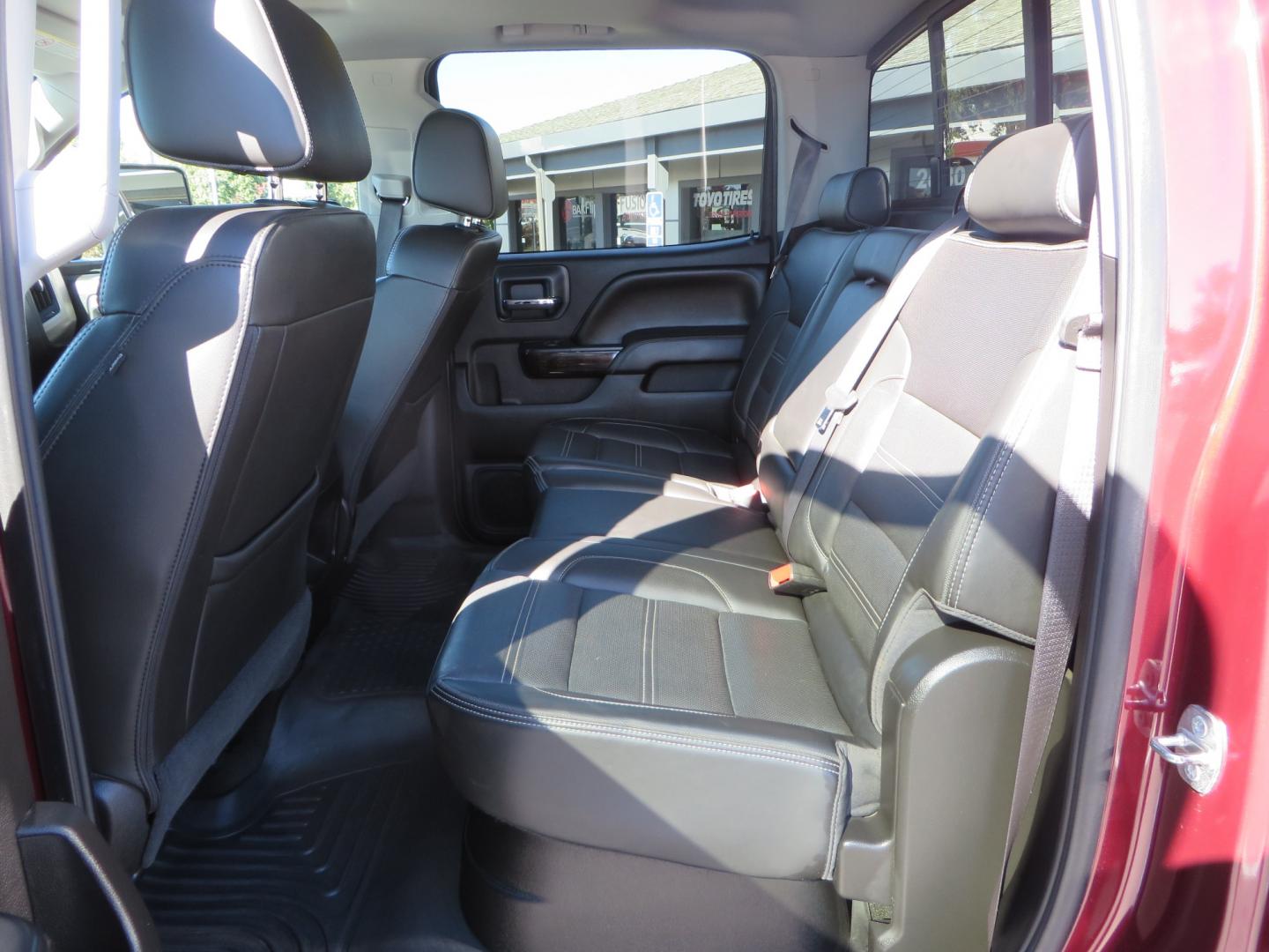 2016 Crimson Red /BLACK GMC Sierra 2500 HD Crew Cab (1GT12UE81GF) with an V8 Turbo Dsl 6.6L engine, Auto 6-Spd Allison OD transmission, located at 2630 Grass Valley Highway, Auburn, CA, 95603, (530) 508-5100, 38.937893, -121.095482 - BDS suspension, Fox Shocks, SOTA Novkane wheels, Nitto Ridge Grappler tires, AMP bed extender, and Husky Floor liners. - Photo#30