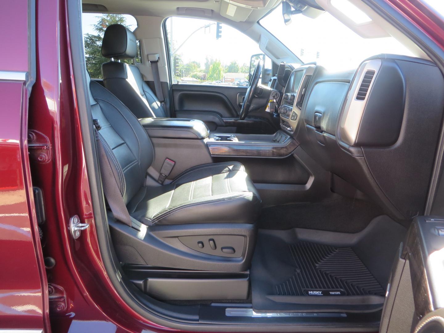 2016 Crimson Red /BLACK GMC Sierra 2500 HD Crew Cab (1GT12UE81GF) with an V8 Turbo Dsl 6.6L engine, Auto 6-Spd Allison OD transmission, located at 2630 Grass Valley Highway, Auburn, CA, 95603, (530) 508-5100, 38.937893, -121.095482 - BDS suspension, Fox Shocks, SOTA Novkane wheels, Nitto Ridge Grappler tires, AMP bed extender, and Husky Floor liners. - Photo#40