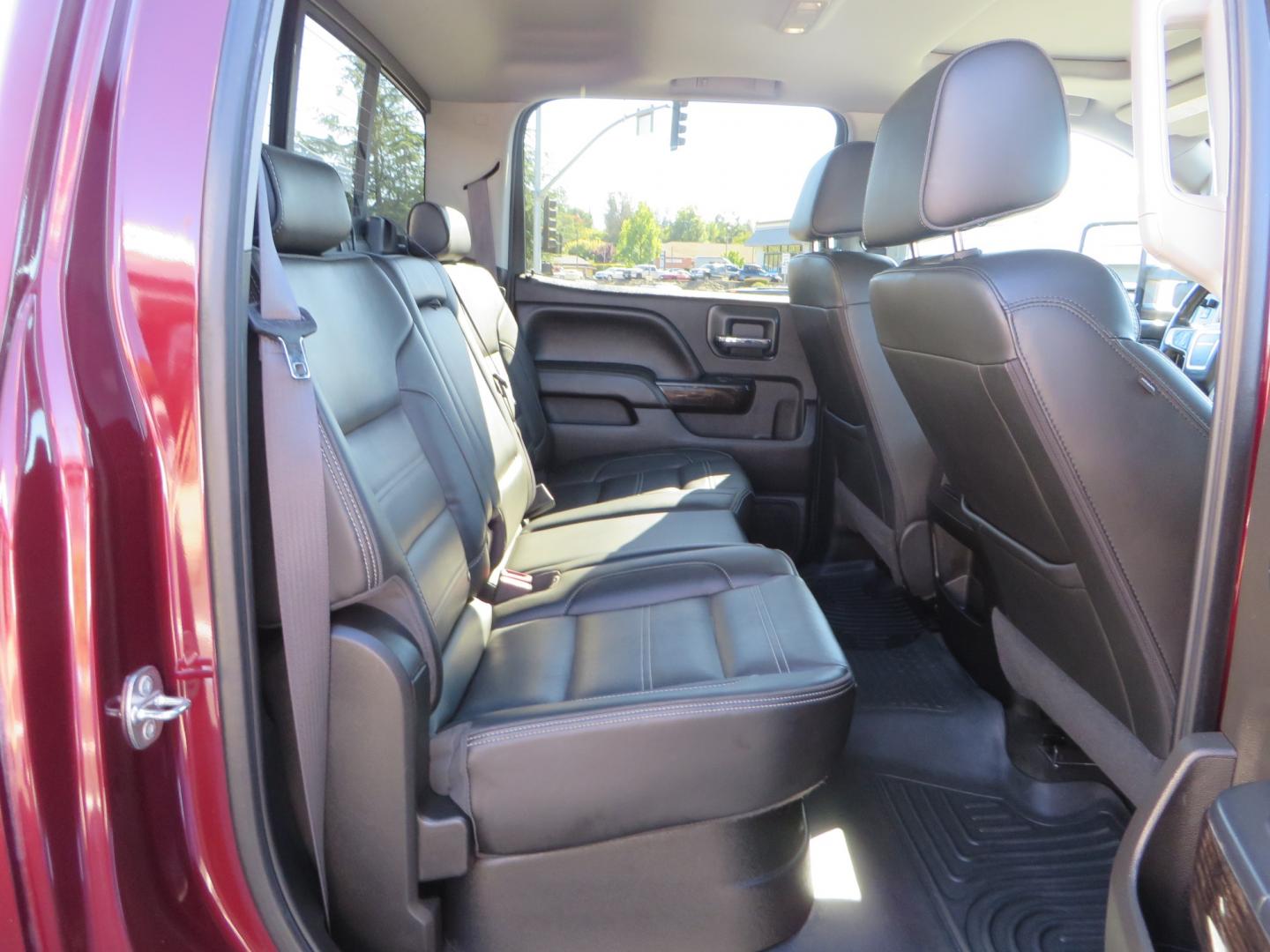 2016 Crimson Red /BLACK GMC Sierra 2500 HD Crew Cab (1GT12UE81GF) with an V8 Turbo Dsl 6.6L engine, Auto 6-Spd Allison OD transmission, located at 2630 Grass Valley Highway, Auburn, CA, 95603, (530) 508-5100, 38.937893, -121.095482 - BDS suspension, Fox Shocks, SOTA Novkane wheels, Nitto Ridge Grappler tires, AMP bed extender, and Husky Floor liners. - Photo#46