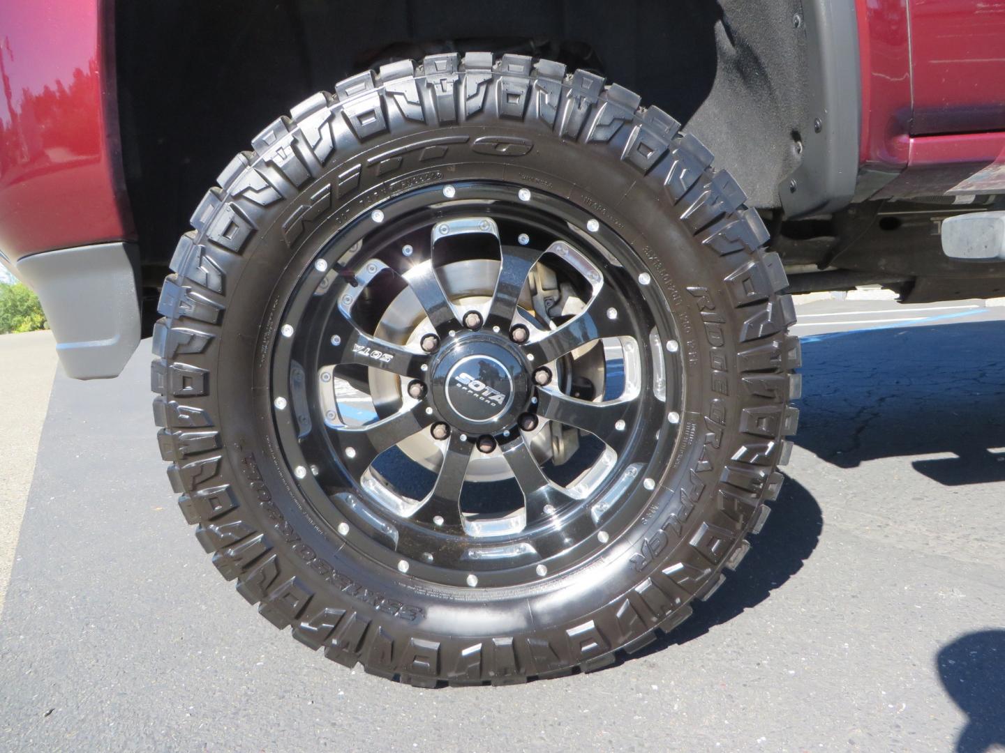 2016 Crimson Red /BLACK GMC Sierra 2500 HD Crew Cab (1GT12UE81GF) with an V8 Turbo Dsl 6.6L engine, Auto 6-Spd Allison OD transmission, located at 2630 Grass Valley Highway, Auburn, CA, 95603, (530) 508-5100, 38.937893, -121.095482 - BDS suspension, Fox Shocks, SOTA Novkane wheels, Nitto Ridge Grappler tires, AMP bed extender, and Husky Floor liners. - Photo#7