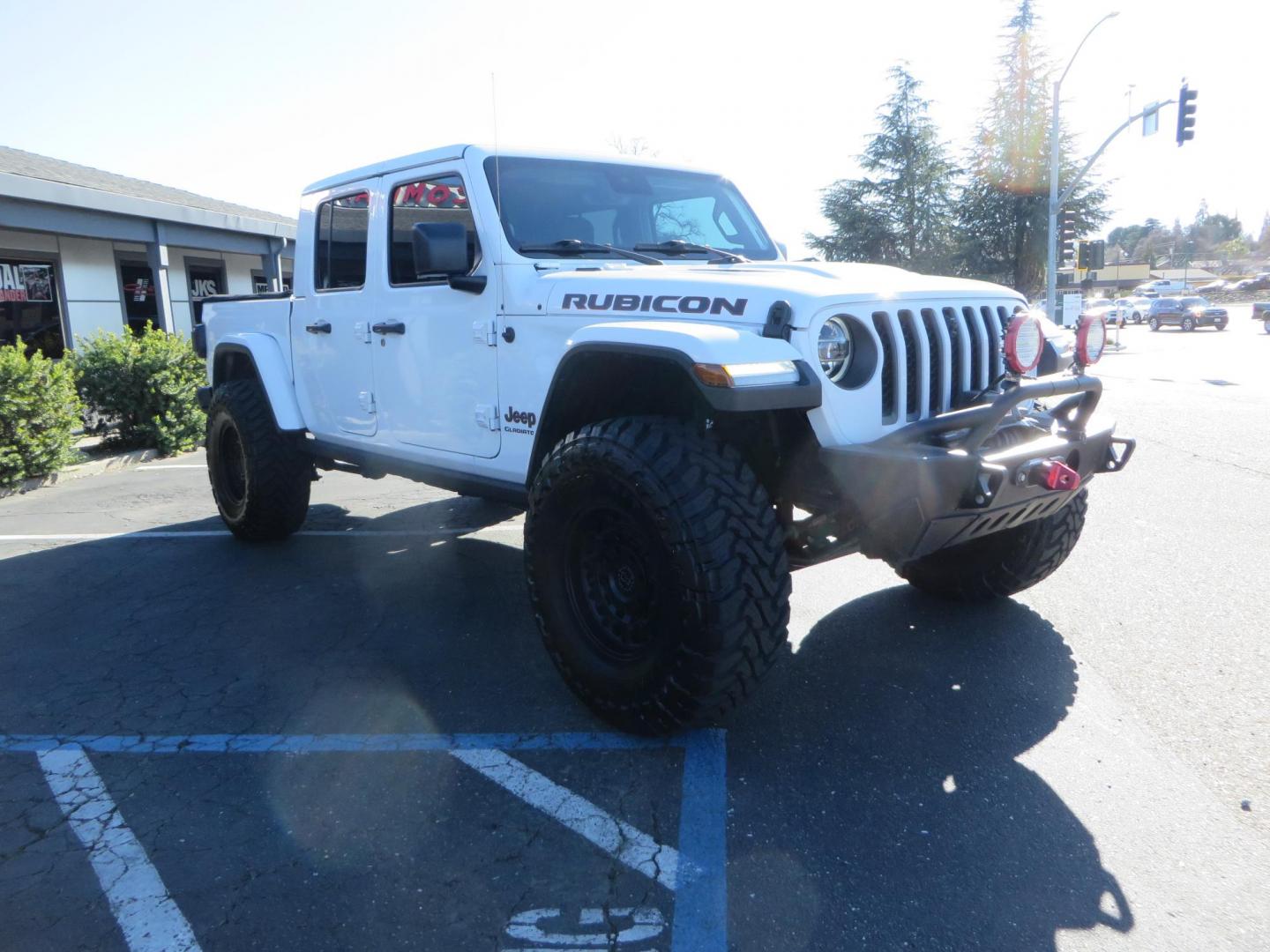 2020 White Jeep Gladiator Rubicon Launch Edition (1C6JJTBG5LL) with an V6 VVT 3.6 Liter engine, Automatic 8-Spd transmission, located at 2630 Grass Valley Highway, Auburn, CA, 95603, (530) 508-5100, 38.937893, -121.095482 - Gladiator Launch Edition, with JKS suspension, Fox shocks and steering stabilizer, 37" Toyo MT tires, Black Rhino Arsenal wheels, Warn Winch, LED lights and Tinted windows. - Photo#2