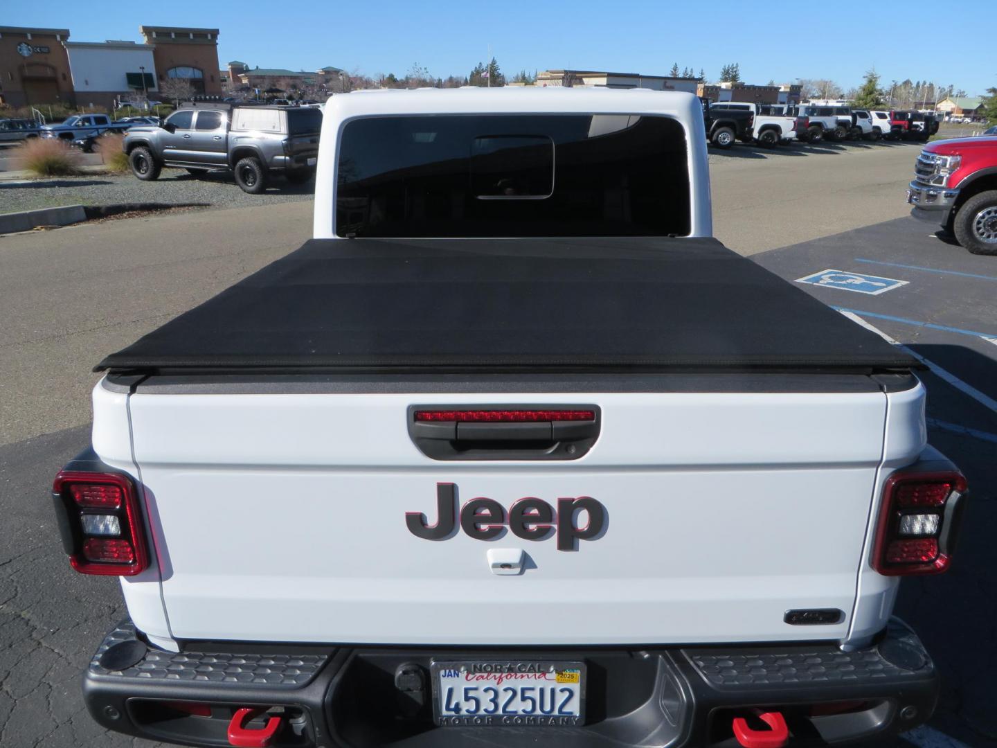 2020 White Jeep Gladiator Rubicon Launch Edition (1C6JJTBG5LL) with an V6 VVT 3.6 Liter engine, Automatic 8-Spd transmission, located at 2630 Grass Valley Highway, Auburn, CA, 95603, (530) 508-5100, 38.937893, -121.095482 - Gladiator Launch Edition, with JKS suspension, Fox shocks and steering stabilizer, 37" Toyo MT tires, Black Rhino Arsenal wheels, Warn Winch, LED lights and Tinted windows. - Photo#17