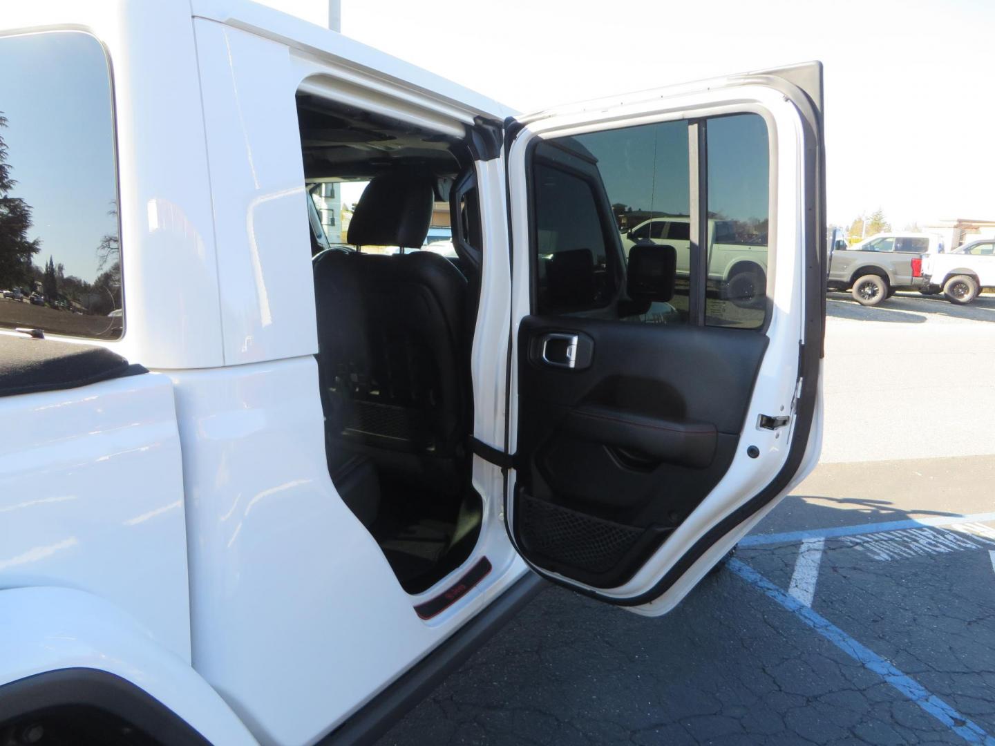 2020 White Jeep Gladiator Rubicon Launch Edition (1C6JJTBG5LL) with an V6 VVT 3.6 Liter engine, Automatic 8-Spd transmission, located at 2630 Grass Valley Highway, Auburn, CA, 95603, (530) 508-5100, 38.937893, -121.095482 - Gladiator Launch Edition, with JKS suspension, Fox shocks and steering stabilizer, 37" Toyo MT tires, Black Rhino Arsenal wheels, Warn Winch, LED lights and Tinted windows. - Photo#56