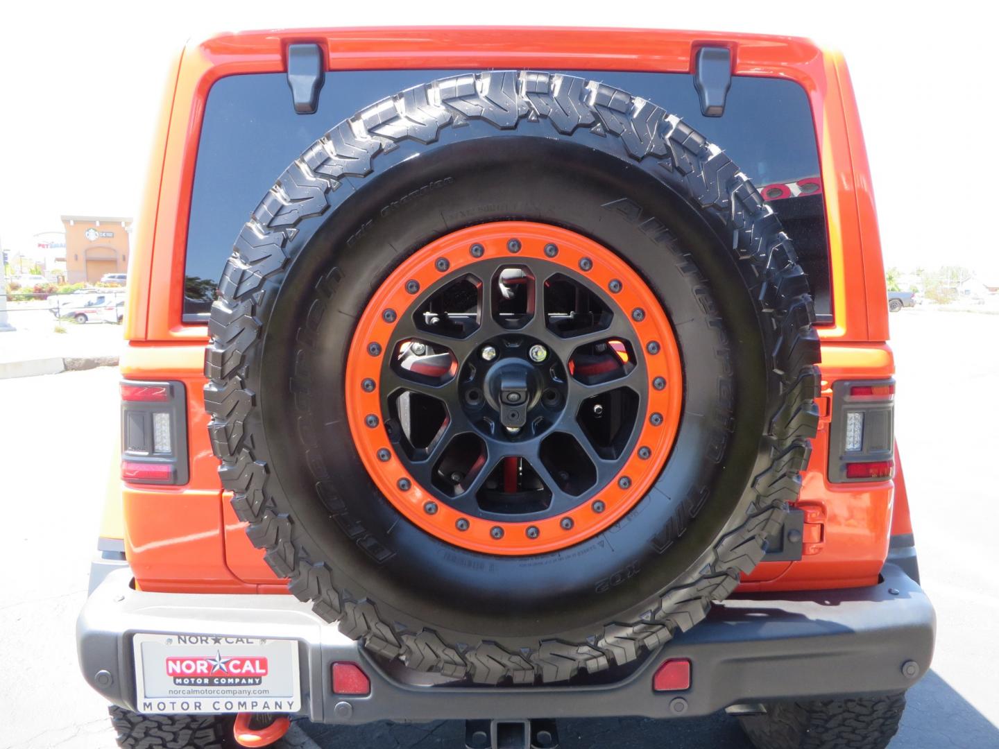 2020 ORANGE /black Jeep Wrangler Rubicon (1C4HJXCG3LW) with an 3.6L V6 DOHC 24V FFV engine, 6A transmission, located at 2630 Grass Valley Highway, Auburn, CA, 95603, (530) 508-5100, 38.937893, -121.095482 - Teraflex suspension, Fox Shocks, Mopar simulated beadlock wheels, 37" BFG KO2 tires, Running boards, Oracle tail lights, window tint, Weathertech floor liners, and a Redline subwoofer. - Photo#11