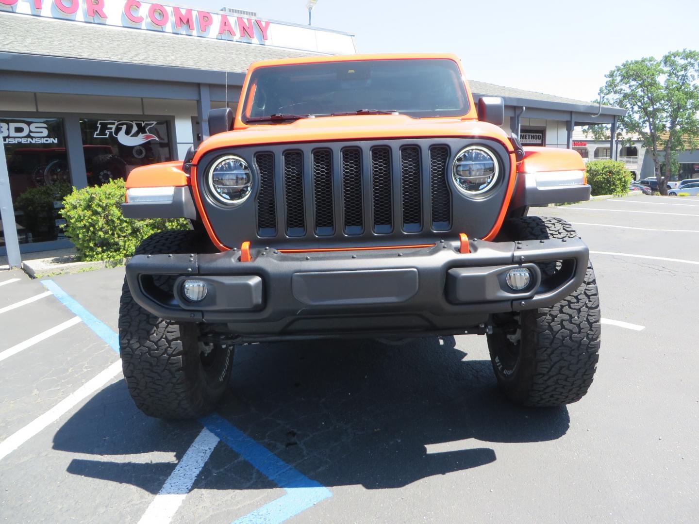 2020 ORANGE /black Jeep Wrangler Rubicon (1C4HJXCG3LW) with an 3.6L V6 DOHC 24V FFV engine, 6A transmission, located at 2630 Grass Valley Highway, Auburn, CA, 95603, (530) 508-5100, 38.937893, -121.095482 - Teraflex suspension, Fox Shocks, Mopar simulated beadlock wheels, 37" BFG KO2 tires, Running boards, Oracle tail lights, window tint, Weathertech floor liners, and a Redline subwoofer. - Photo#1