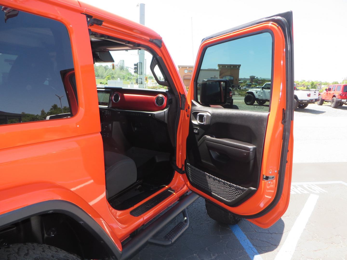 2020 ORANGE /black Jeep Wrangler Rubicon (1C4HJXCG3LW) with an 3.6L V6 DOHC 24V FFV engine, 6A transmission, located at 2630 Grass Valley Highway, Auburn, CA, 95603, (530) 508-5100, 38.937893, -121.095482 - Teraflex suspension, Fox Shocks, Mopar simulated beadlock wheels, 37" BFG KO2 tires, Running boards, Oracle tail lights, window tint, Weathertech floor liners, and a Redline subwoofer. - Photo#35