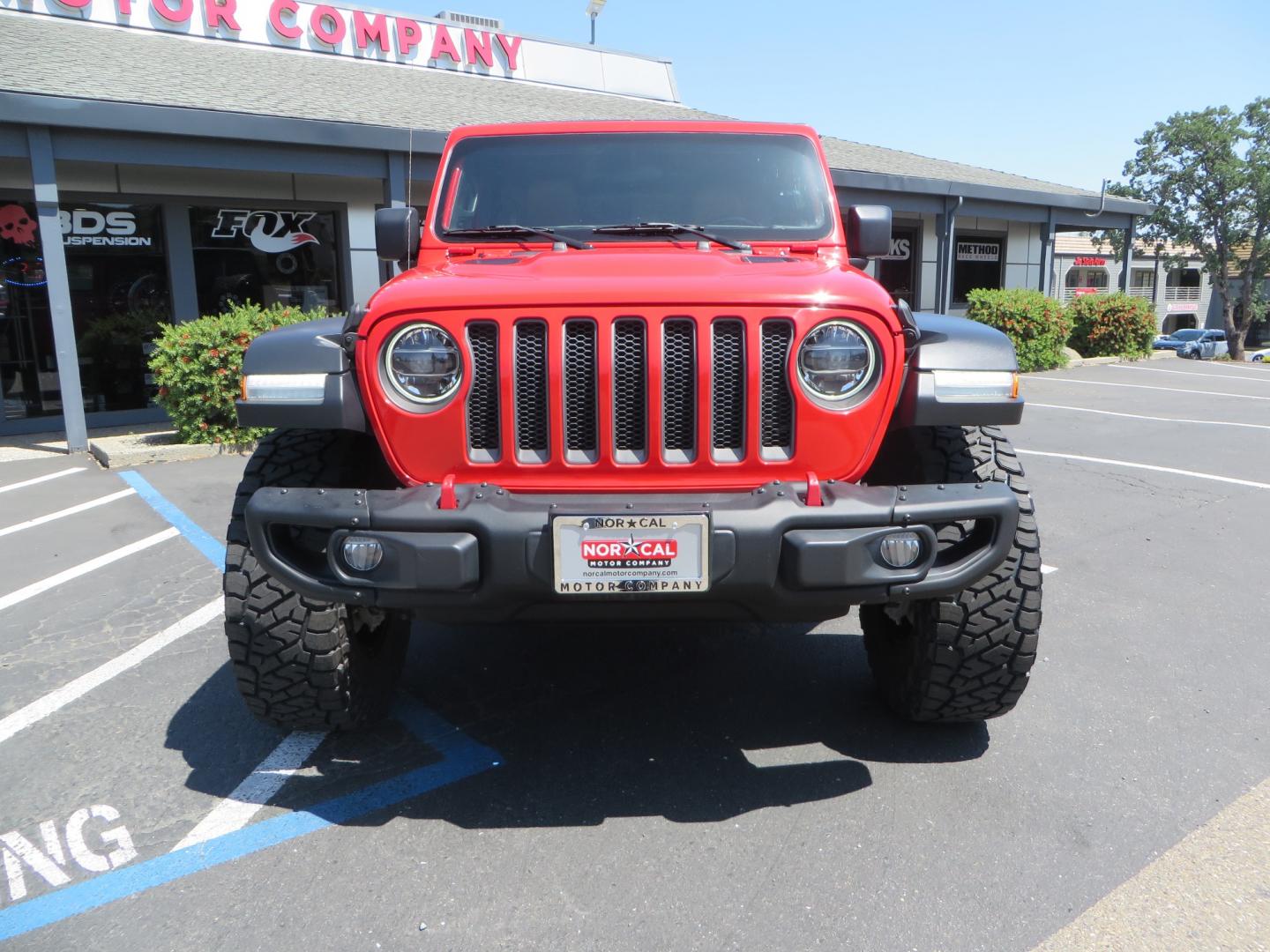 2020 Red /TAN Jeep Wrangler Unlimited Rubicon (1C4HJXFN8LW) with an 2.0L L4 DOHC 16V TURBO engine, 6A transmission, located at 2630 Grass Valley Highway, Auburn, CA, 95603, (530) 508-5100, 38.937893, -121.095482 - Featuring a brand new set of 17" Fuel Recoil wheels and 35" Toyo RT trail tires. - Photo#1