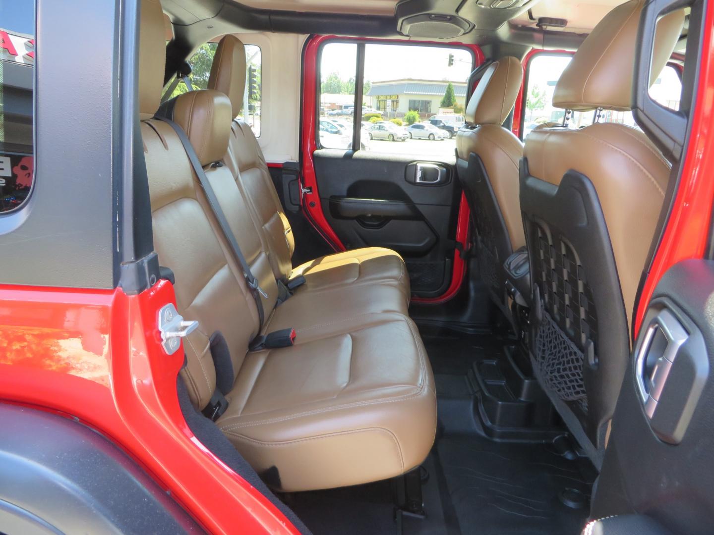 2020 Red /TAN Jeep Wrangler Unlimited Rubicon (1C4HJXFN8LW) with an 2.0L L4 DOHC 16V TURBO engine, 6A transmission, located at 2630 Grass Valley Highway, Auburn, CA, 95603, (530) 508-5100, 38.937893, -121.095482 - Featuring a brand new set of 17" Fuel Recoil wheels and 35" Toyo RT trail tires. - Photo#43