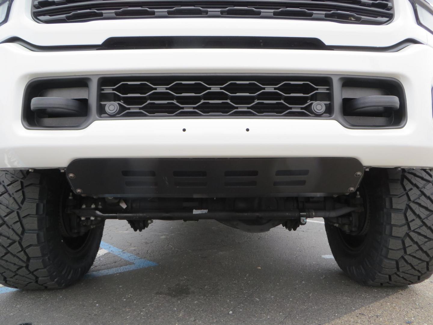 2023 White /BLACK RAM 3500 Limited Mega Cab 4WD (3C63R3PL6PG) with an 6.7L L6 OHV 24V TURBO DIESEL engine, 6A transmission, located at 2630 Grass Valley Highway, Auburn, CA, 95603, (530) 508-5100, 38.937893, -121.095482 - Limited Ram 3500 with a BDS 4" long arm suspension system, Fox 2.5 Performance Elite series shocks, Fox ATS steering stabilizer, Carli Suspension rear leaf spring Add- A-Packs, 37" Nitto Ridge Grappler tires, 20X10 Fuel Clash wheels, CJC Offroad Intercooler guard, B&W tow and stow hitch, Bolt hitch - Photo#14