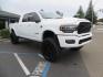 2023 White /BLACK RAM 3500 Limited Mega Cab 4WD (3C63R3PL6PG) with an 6.7L L6 OHV 24V TURBO DIESEL engine, 6A transmission, located at 2630 Grass Valley Highway, Auburn, CA, 95603, (530) 508-5100, 38.937893, -121.095482 - Limited Ram 3500 with a BDS 4" long arm suspension system, Fox 2.5 Performance Elite series shocks, Fox ATS steering stabilizer, Carli Suspension rear leaf spring Add- A-Packs, 37" Nitto Ridge Grappler tires, 20X10 Fuel Clash wheels, CJC Offroad Intercooler guard, B&W tow and stow hitch, Bolt hitch - Photo#2