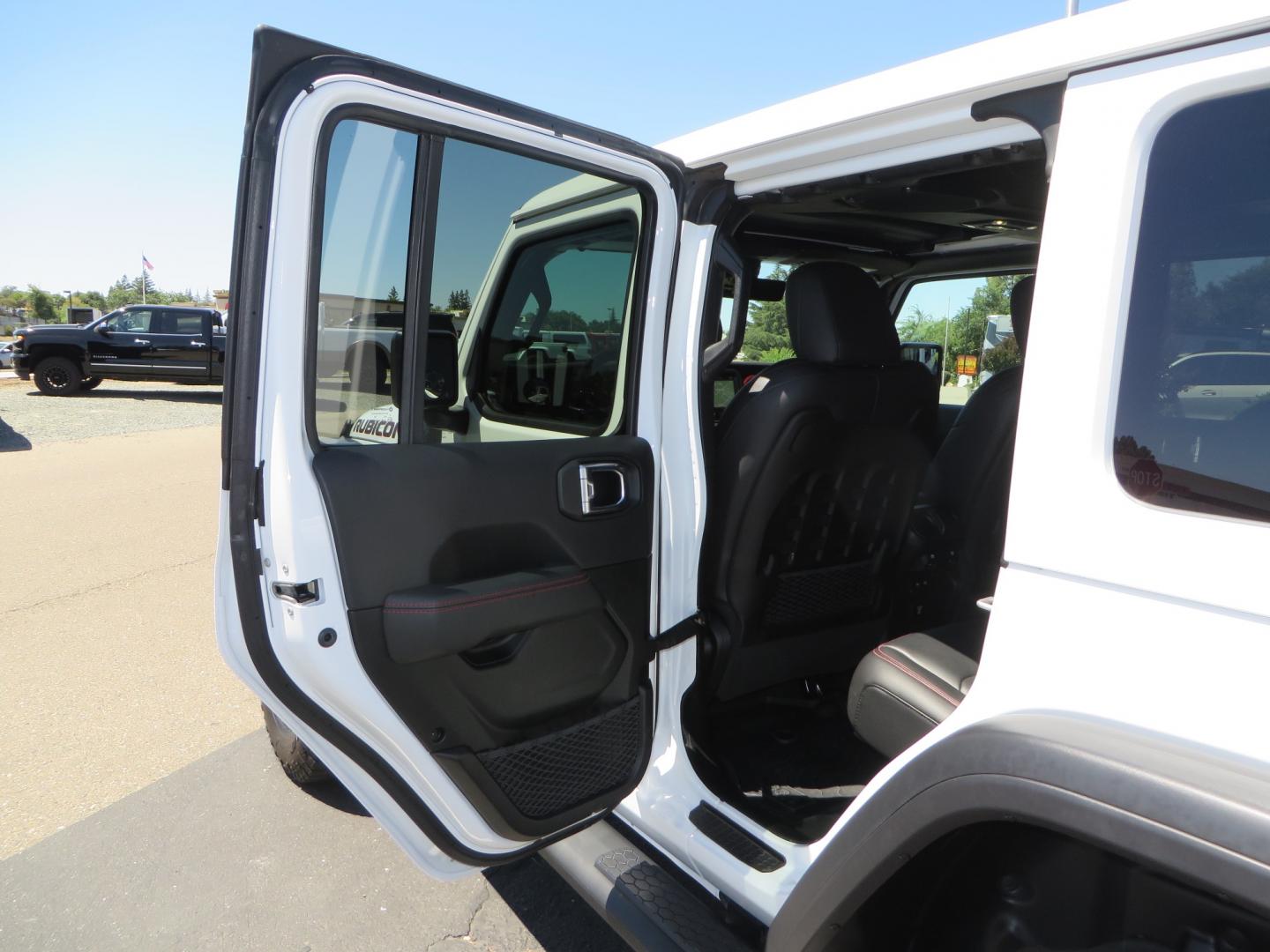 2021 White /BLACK Jeep Wrangler Unlimited Rubicon (1C4HJXFG1MW) with an 3.6L V6 DOHC 24V FFV engine, Manual 6 speed transmission, located at 2630 Grass Valley Highway, Auburn, CA, 95603, (530) 508-5100, 38.937893, -121.095482 - This manual transmission Rubicon is set up with a Mopar suspension systems, Fox shocks, 17" Method Race wheels, and 35" Falken Wildpeak AT3W tires. - Photo#37