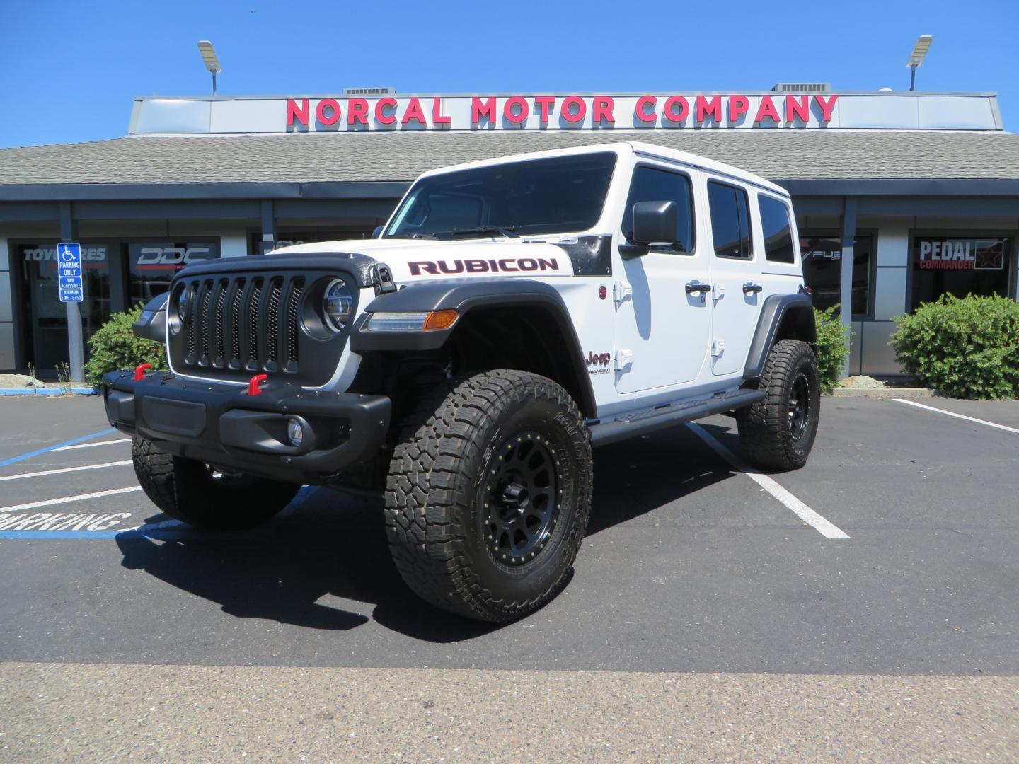 2021 White /BLACK Jeep Wrangler Unlimited Rubicon (1C4HJXFG1MW) with an 3.6L V6 DOHC 24V FFV engine, Manual 6 speed transmission, located at 2630 Grass Valley Highway, Auburn, CA, 95603, (530) 508-5100, 38.937893, -121.095482 - This manual transmission Rubicon is set up with a Mopar suspension systems, Fox shocks, 17" Method Race wheels, and 35" Falken Wildpeak AT3W tires. - Photo#0