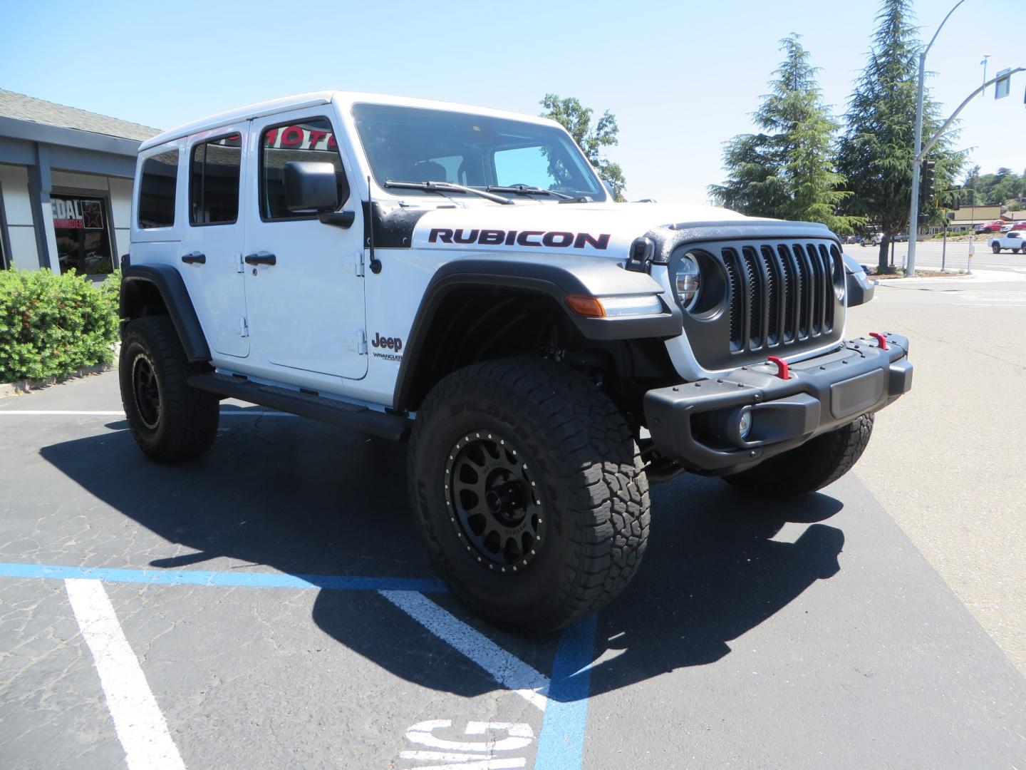 2021 White /BLACK Jeep Wrangler Unlimited Rubicon (1C4HJXFG1MW) with an 3.6L V6 DOHC 24V FFV engine, Manual 6 speed transmission, located at 2630 Grass Valley Highway, Auburn, CA, 95603, (530) 508-5100, 38.937893, -121.095482 - This manual transmission Rubicon is set up with a Mopar suspension systems, Fox shocks, 17" Method Race wheels, and 35" Falken Wildpeak AT3W tires. - Photo#2