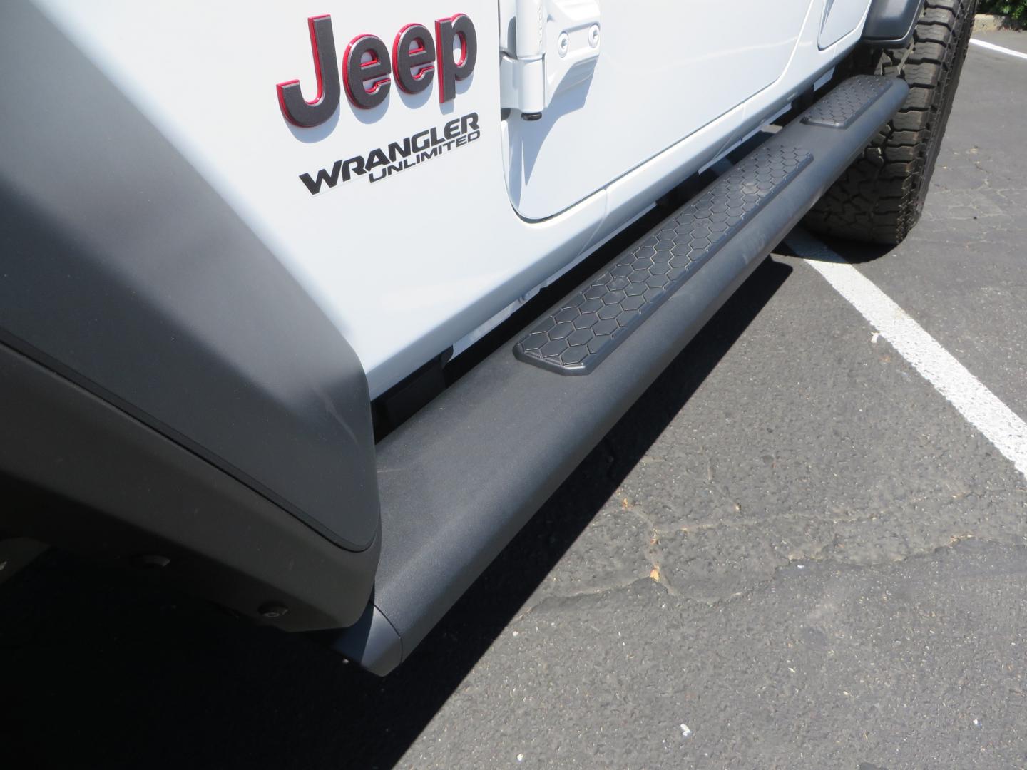 2021 White /BLACK Jeep Wrangler Unlimited Rubicon (1C4HJXFG1MW) with an 3.6L V6 DOHC 24V FFV engine, Manual 6 speed transmission, located at 2630 Grass Valley Highway, Auburn, CA, 95603, (530) 508-5100, 38.937893, -121.095482 - This manual transmission Rubicon is set up with a Mopar suspension systems, Fox shocks, 17" Method Race wheels, and 35" Falken Wildpeak AT3W tires. - Photo#10