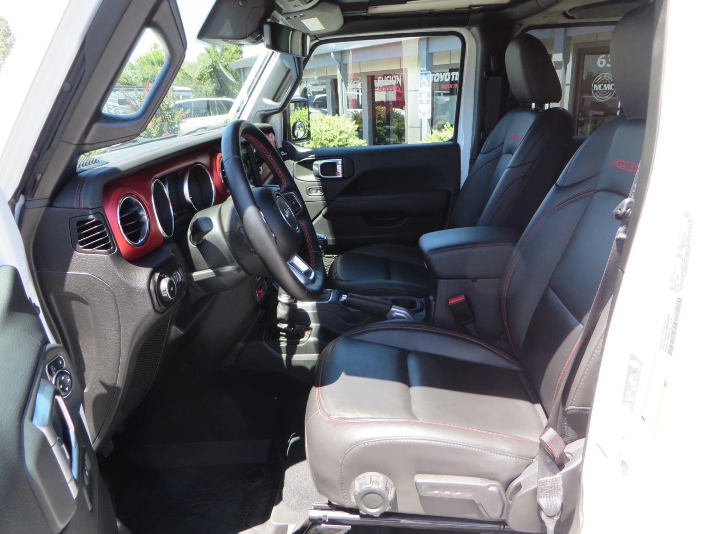 2021 White /BLACK Jeep Wrangler Unlimited Rubicon (1C4HJXFG1MW) with an 3.6L V6 DOHC 24V FFV engine, Manual 6 speed transmission, located at 2630 Grass Valley Highway, Auburn, CA, 95603, (530) 508-5100, 38.937893, -121.095482 - This manual transmission Rubicon is set up with a Mopar suspension systems, Fox shocks, 17" Method Race wheels, and 35" Falken Wildpeak AT3W tires. - Photo#17