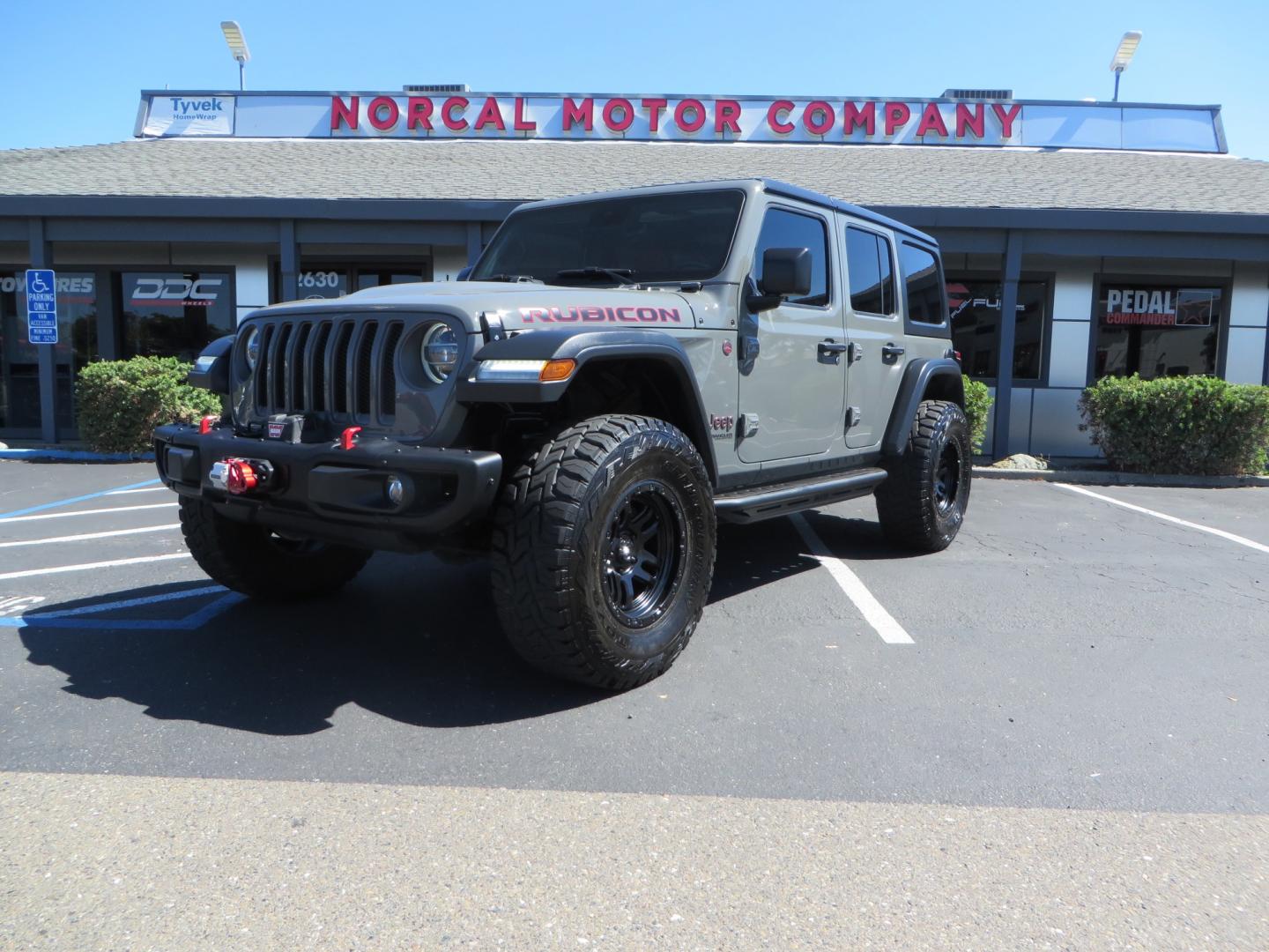 2019 Gray /RED Jeep Wrangler Unlimited Rubicon (1C4HJXFN0KW) with an 2.0L L4 DOHC 16V TURBO engine, 6A transmission, located at 2630 Grass Valley Highway, Auburn, CA, 95603, (530) 508-5100, 38.937893, -121.095482 - Lifted wrangler featuring 17" Fuel wheels, 35" Toyo Open Country RT tires, Warn VR10 synthetic rope winch, Factor 55 Ultra Hook, Westin running boards, window tint, Weathertech floor liners, and custom red / black interior. - Photo#0