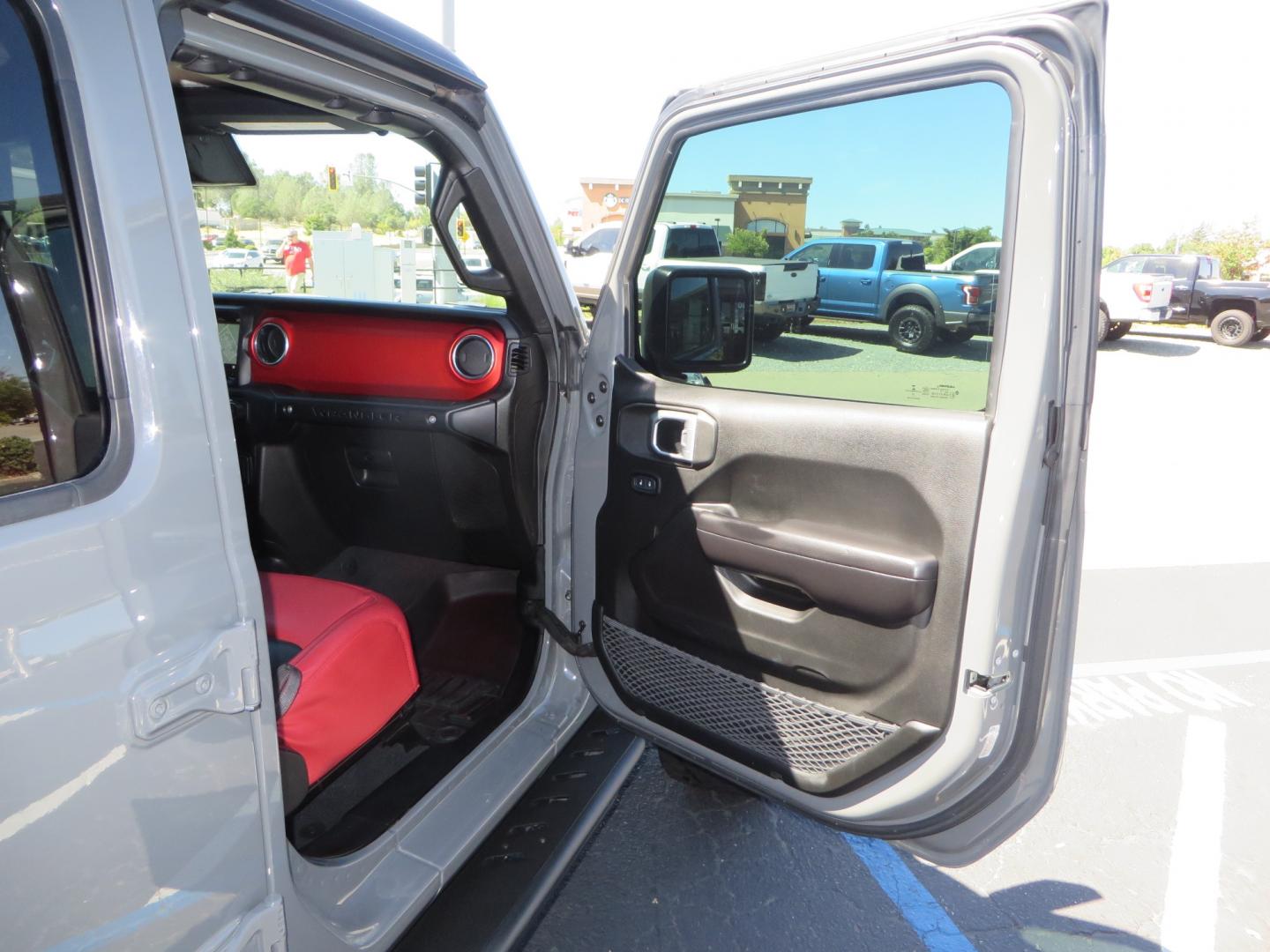 2019 Gray /RED Jeep Wrangler Unlimited Rubicon (1C4HJXFN0KW) with an 2.0L L4 DOHC 16V TURBO engine, 6A transmission, located at 2630 Grass Valley Highway, Auburn, CA, 95603, (530) 508-5100, 38.937893, -121.095482 - Lifted wrangler featuring 17" Fuel wheels, 35" Toyo Open Country RT tires, Warn VR10 synthetic rope winch, Factor 55 Ultra Hook, Westin running boards, window tint, Weathertech floor liners, and custom red / black interior. - Photo#42