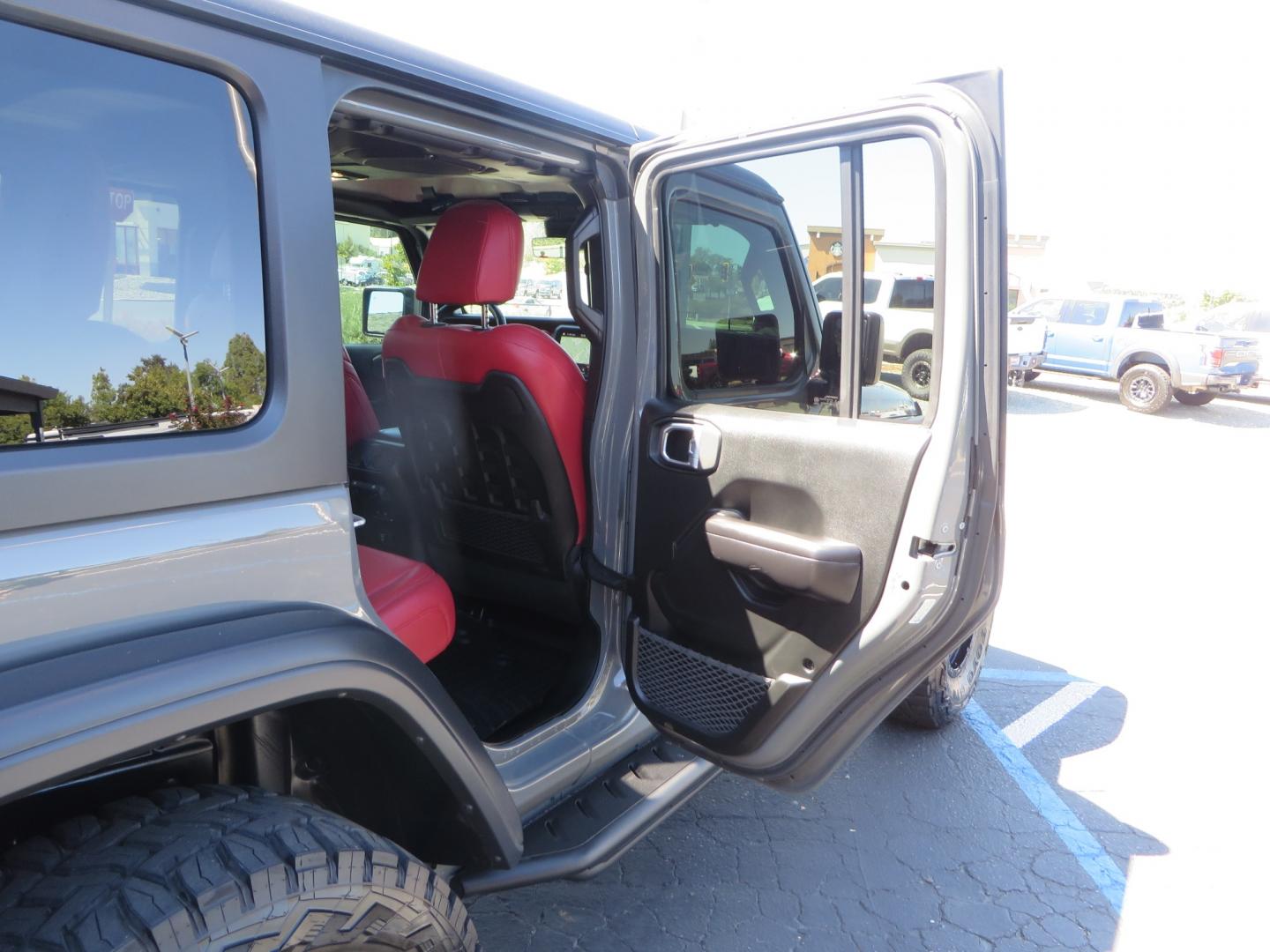 2019 Gray /RED Jeep Wrangler Unlimited Rubicon (1C4HJXFN0KW) with an 2.0L L4 DOHC 16V TURBO engine, 6A transmission, located at 2630 Grass Valley Highway, Auburn, CA, 95603, (530) 508-5100, 38.937893, -121.095482 - Lifted wrangler featuring 17" Fuel wheels, 35" Toyo Open Country RT tires, Warn VR10 synthetic rope winch, Factor 55 Ultra Hook, Westin running boards, window tint, Weathertech floor liners, and custom red / black interior. - Photo#47