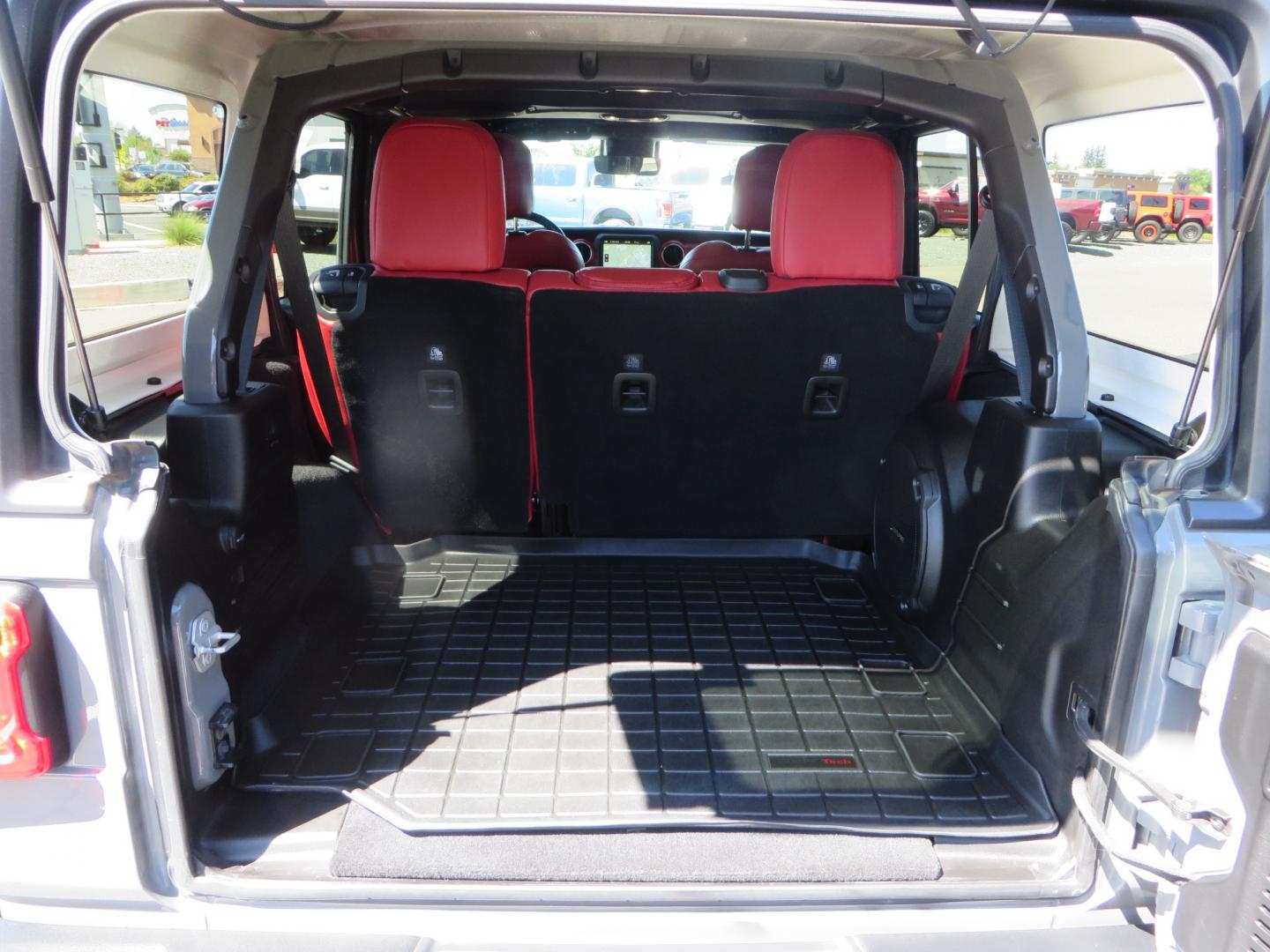 2019 Gray /RED Jeep Wrangler Unlimited Rubicon (1C4HJXFN0KW) with an 2.0L L4 DOHC 16V TURBO engine, 6A transmission, located at 2630 Grass Valley Highway, Auburn, CA, 95603, (530) 508-5100, 38.937893, -121.095482 - Lifted wrangler featuring 17" Fuel wheels, 35" Toyo Open Country RT tires, Warn VR10 synthetic rope winch, Factor 55 Ultra Hook, Westin running boards, window tint, Weathertech floor liners, and custom red / black interior. - Photo#55