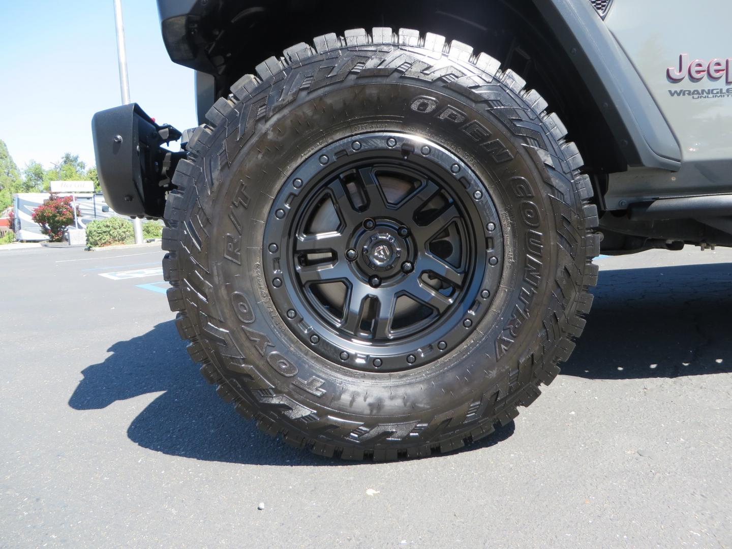 2019 Gray /RED Jeep Wrangler Unlimited Rubicon (1C4HJXFN0KW) with an 2.0L L4 DOHC 16V TURBO engine, 6A transmission, located at 2630 Grass Valley Highway, Auburn, CA, 95603, (530) 508-5100, 38.937893, -121.095482 - Lifted wrangler featuring 17" Fuel wheels, 35" Toyo Open Country RT tires, Warn VR10 synthetic rope winch, Factor 55 Ultra Hook, Westin running boards, window tint, Weathertech floor liners, and custom red / black interior. - Photo#8