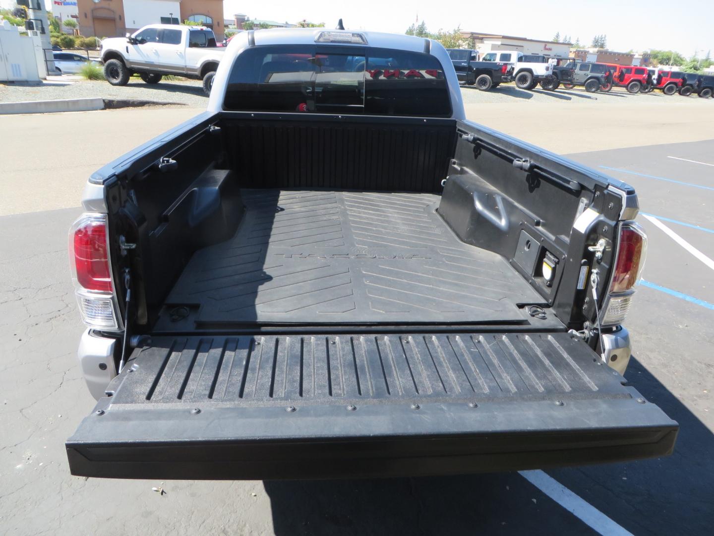 2020 /BLACK Toyota Tacoma TRD OFF-ROAD Double Cab Long Bed V6 6AT 4WD (3TMDZ5BN8LM) with an 3.5L V6 DOHC 24V engine, 6A transmission, located at 2630 Grass Valley Highway, Auburn, CA, 95603, (530) 508-5100, 38.937893, -121.095482 - Built Tacoma that you arent going to want to miss. This truck features a set of Bilstein 6112 front struts, Bilstein 5160 rear shocks, SPC upper control arms, SCS wheels, Falken Wildpeak AT3W tires, All Pro Offroad rear springs, and a set of rock sliders. - Photo#12