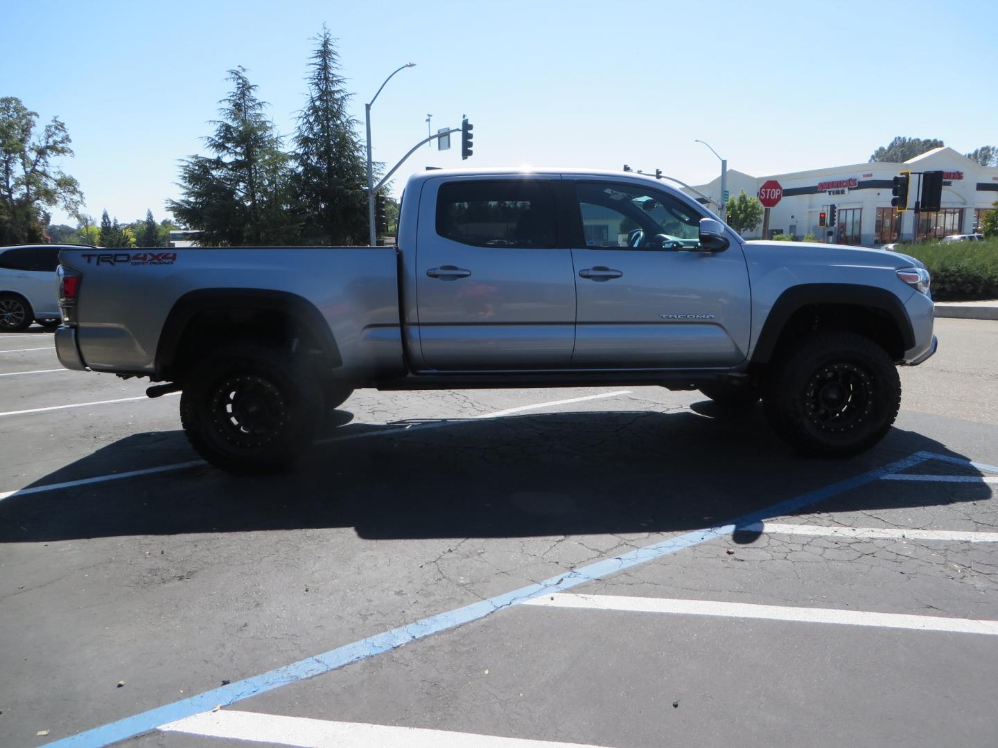 2020 /BLACK Toyota Tacoma TRD OFF-ROAD Double Cab Long Bed V6 6AT 4WD (3TMDZ5BN8LM) with an 3.5L V6 DOHC 24V engine, 6A transmission, located at 2630 Grass Valley Highway, Auburn, CA, 95603, (530) 508-5100, 38.937893, -121.095482 - Built Tacoma that you arent going to want to miss. This truck features a set of Bilstein 6112 front struts, Bilstein 5160 rear shocks, SPC upper control arms, SCS wheels, Falken Wildpeak AT3W tires, All Pro Offroad rear springs, and a set of rock sliders. - Photo#3