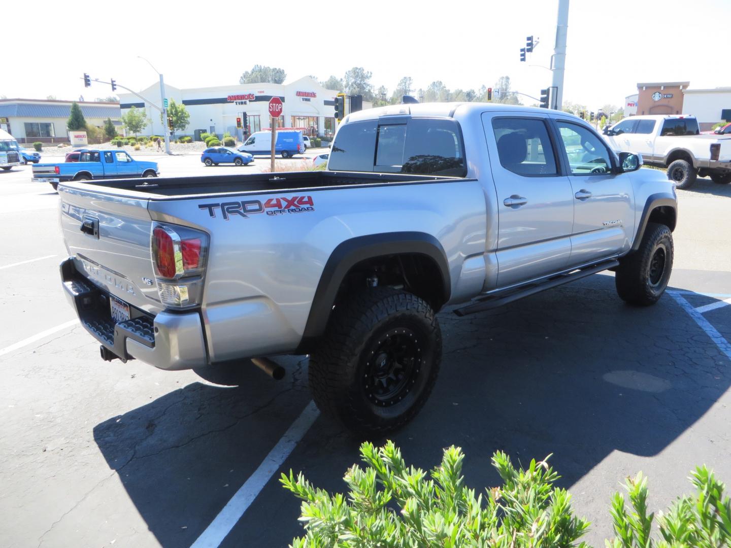 2020 /BLACK Toyota Tacoma TRD OFF-ROAD Double Cab Long Bed V6 6AT 4WD (3TMDZ5BN8LM) with an 3.5L V6 DOHC 24V engine, 6A transmission, located at 2630 Grass Valley Highway, Auburn, CA, 95603, (530) 508-5100, 38.937893, -121.095482 - Built Tacoma that you arent going to want to miss. This truck features a set of Bilstein 6112 front struts, Bilstein 5160 rear shocks, SPC upper control arms, SCS wheels, Falken Wildpeak AT3W tires, All Pro Offroad rear springs, and a set of rock sliders. - Photo#4