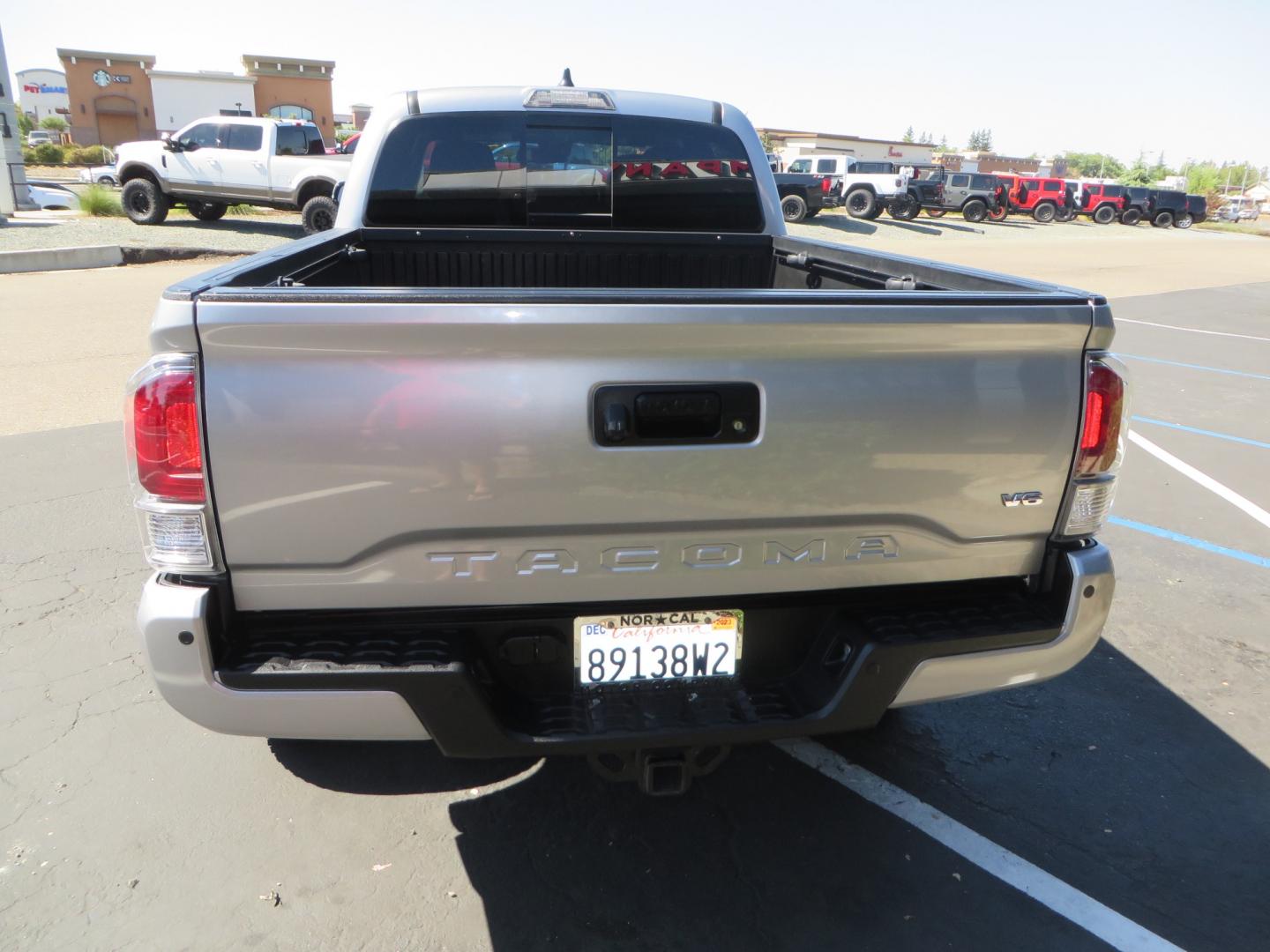 2020 /BLACK Toyota Tacoma TRD OFF-ROAD Double Cab Long Bed V6 6AT 4WD (3TMDZ5BN8LM) with an 3.5L V6 DOHC 24V engine, 6A transmission, located at 2630 Grass Valley Highway, Auburn, CA, 95603, (530) 508-5100, 38.937893, -121.095482 - Built Tacoma that you arent going to want to miss. This truck features a set of Bilstein 6112 front struts, Bilstein 5160 rear shocks, SPC upper control arms, SCS wheels, Falken Wildpeak AT3W tires, All Pro Offroad rear springs, and a set of rock sliders. - Photo#5