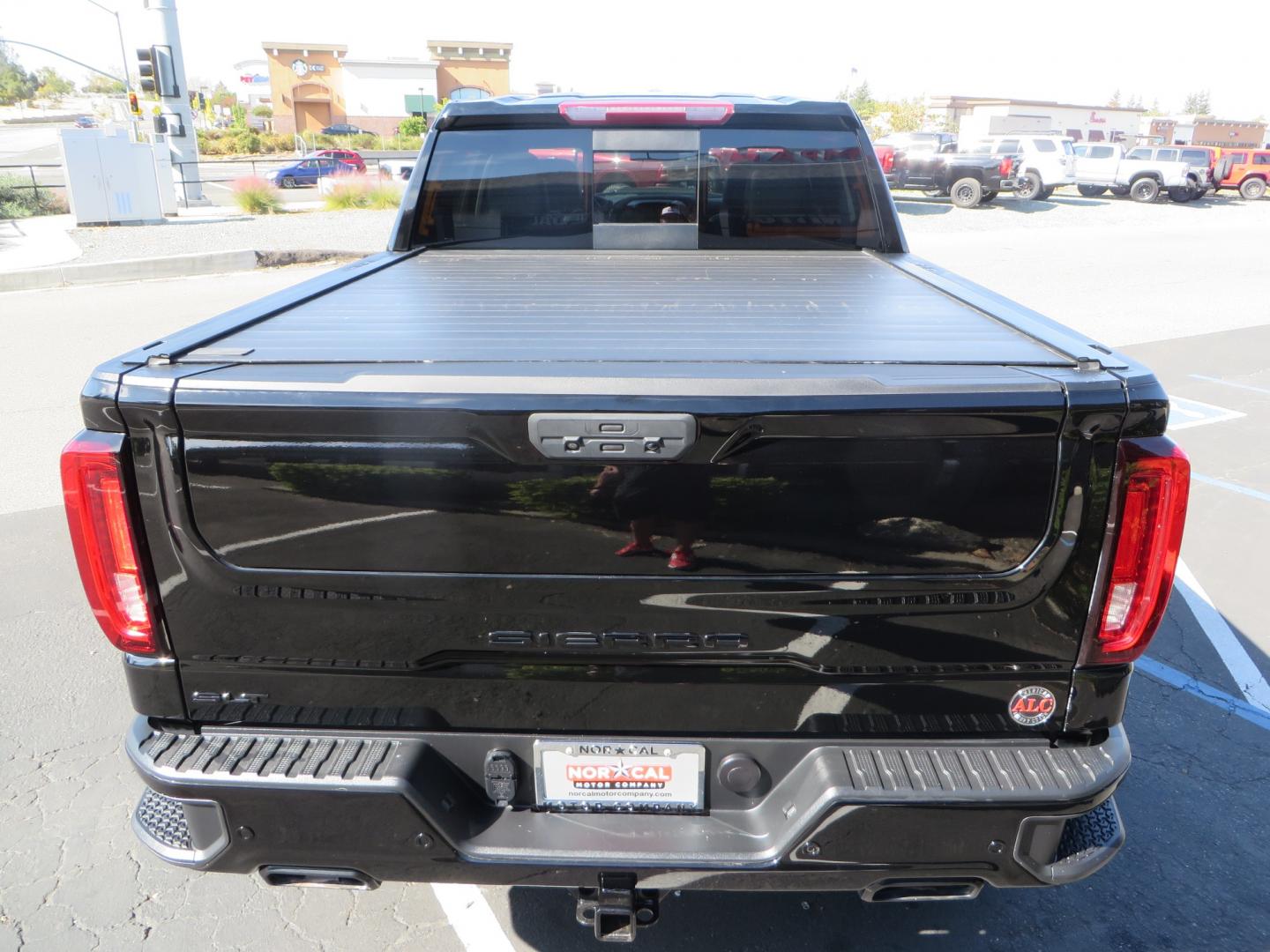 2020 Black GMC Sierra 1500 SLT Crew Cab Short Box 4WD (3GTU9DEL2LG) with an 6.2L V8 OHV 16V engine, 6A transmission, located at 2630 Grass Valley Highway, Auburn, CA, 95603, (530) 508-5100, 38.937893, -121.095482 - An American Luxury Coach Z92 built 1500. Features a 6" Lift kit, 20" Fuel wheels, 35" Nitto Ridge Grappler tires, Westin Running boards, Power Tonneau cover, Window tint, Katzkin leather, and window deflectors. - Photo#10