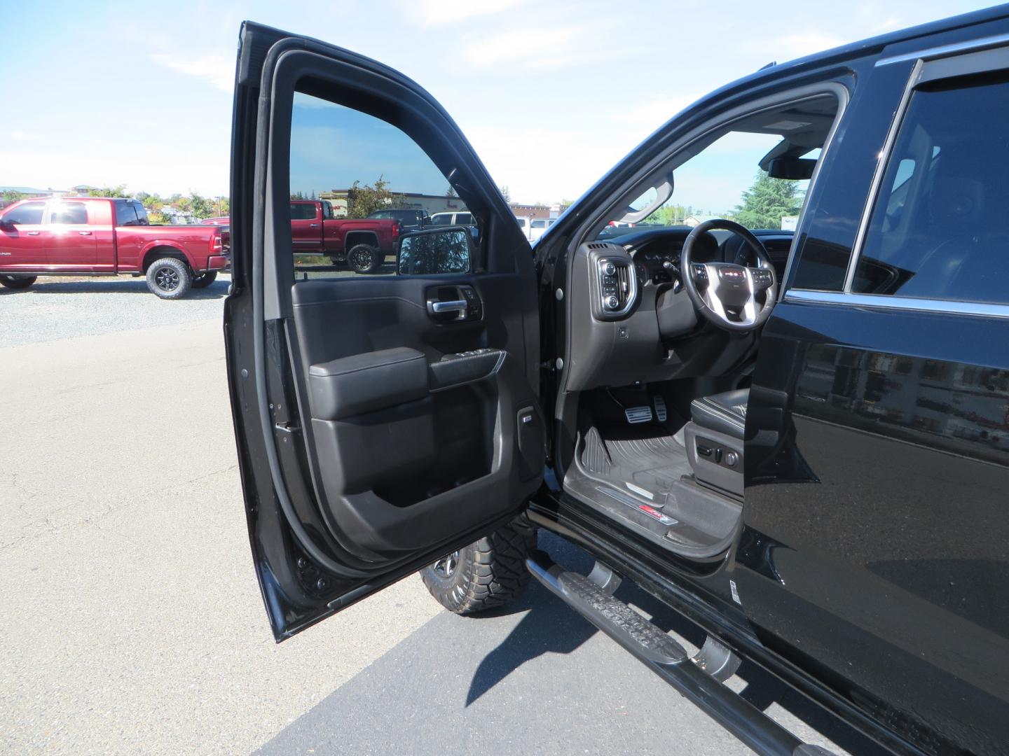 2020 Black GMC Sierra 1500 SLT Crew Cab Short Box 4WD (3GTU9DEL2LG) with an 6.2L V8 OHV 16V engine, 6A transmission, located at 2630 Grass Valley Highway, Auburn, CA, 95603, (530) 508-5100, 38.937893, -121.095482 - An American Luxury Coach Z92 built 1500. Features a 6" Lift kit, 20" Fuel wheels, 35" Nitto Ridge Grappler tires, Westin Running boards, Power Tonneau cover, Window tint, Katzkin leather, and window deflectors. - Photo#13