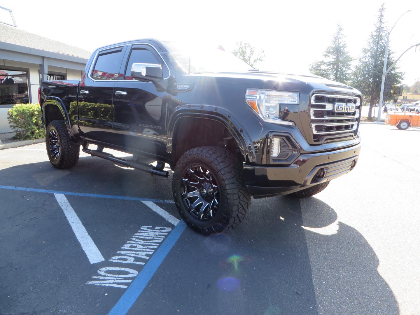 2020 Black GMC Sierra 1500 SLT Crew Cab Short Box 4WD (3GTU9DEL2LG) with an 6.2L V8 OHV 16V engine, 6A transmission, located at 2630 Grass Valley Highway, Auburn, CA, 95603, (530) 508-5100, 38.937893, -121.095482 - An American Luxury Coach Z92 built 1500. Features a 6" Lift kit, 20" Fuel wheels, 35" Nitto Ridge Grappler tires, Westin Running boards, Power Tonneau cover, Window tint, Katzkin leather, and window deflectors. - Photo#2