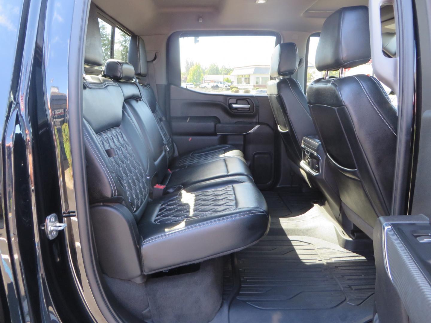 2020 Black GMC Sierra 1500 SLT Crew Cab Short Box 4WD (3GTU9DEL2LG) with an 6.2L V8 OHV 16V engine, 6A transmission, located at 2630 Grass Valley Highway, Auburn, CA, 95603, (530) 508-5100, 38.937893, -121.095482 - An American Luxury Coach Z92 built 1500. Features a 6" Lift kit, 20" Fuel wheels, 35" Nitto Ridge Grappler tires, Westin Running boards, Power Tonneau cover, Window tint, Katzkin leather, and window deflectors. - Photo#52