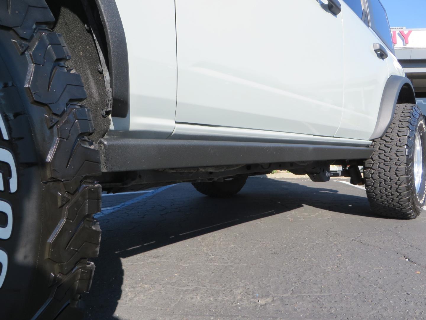 2023 Gray /BLACK Ford Bronco Badlands 4-Door w/Advanced (1FMEE5DP1PL) with an 2.7L V6 DOHC 24V engine, 7M transmission, located at 2630 Grass Valley Highway, Auburn, CA, 95603, (530) 508-5100, 38.937893, -121.095482 - Features a Zone offroad 1" level kit, 17" American Racing Baja wheels, 35" BFG KO2 tires, window tint, RC spare tire relocation & 3rd brake light extension. - Photo#10