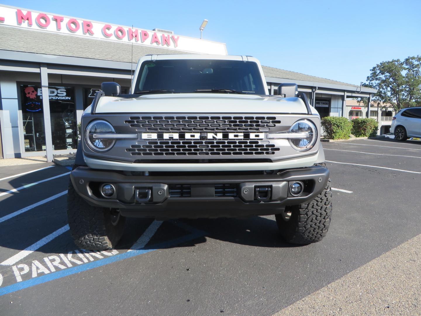 2023 Gray /BLACK Ford Bronco Badlands 4-Door w/Advanced (1FMEE5DP1PL) with an 2.7L V6 DOHC 24V engine, 7M transmission, located at 2630 Grass Valley Highway, Auburn, CA, 95603, (530) 508-5100, 38.937893, -121.095482 - Features a Zone offroad 1" level kit, 17" American Racing Baja wheels, 35" BFG KO2 tires, window tint, RC spare tire relocation & 3rd brake light extension. - Photo#1