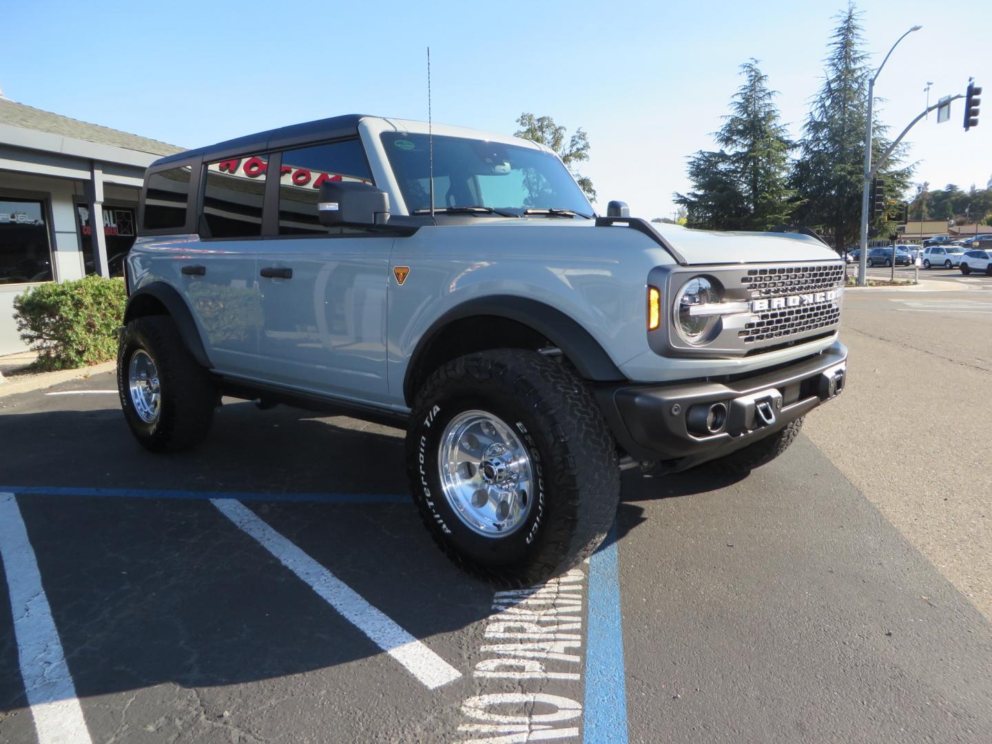 2023 Gray /BLACK Ford Bronco Badlands 4-Door w/Advanced (1FMEE5DP1PL) with an 2.7L V6 DOHC 24V engine, 7M transmission, located at 2630 Grass Valley Highway, Auburn, CA, 95603, (530) 508-5100, 38.937893, -121.095482 - Features a Zone offroad 1" level kit, 17" American Racing Baja wheels, 35" BFG KO2 tires, window tint, RC spare tire relocation & 3rd brake light extension. - Photo#2