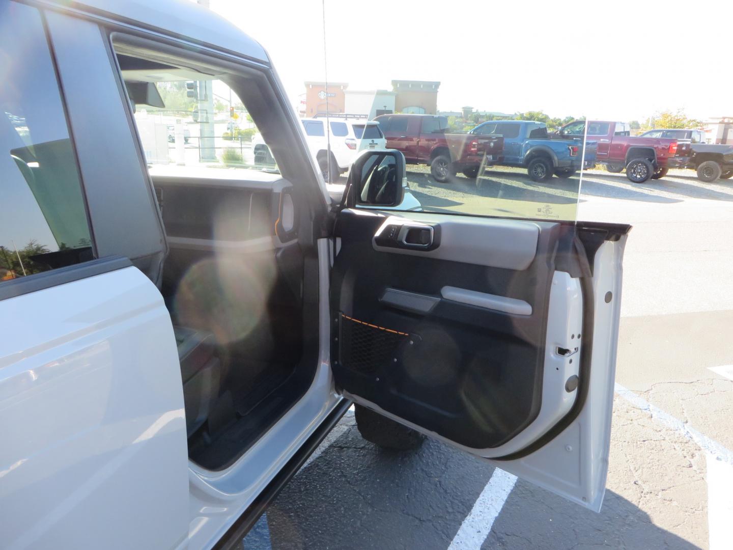 2023 Gray /BLACK Ford Bronco Badlands 4-Door w/Advanced (1FMEE5DP1PL) with an 2.7L V6 DOHC 24V engine, 7M transmission, located at 2630 Grass Valley Highway, Auburn, CA, 95603, (530) 508-5100, 38.937893, -121.095482 - Features a Zone offroad 1" level kit, 17" American Racing Baja wheels, 35" BFG KO2 tires, window tint, RC spare tire relocation & 3rd brake light extension. - Photo#37