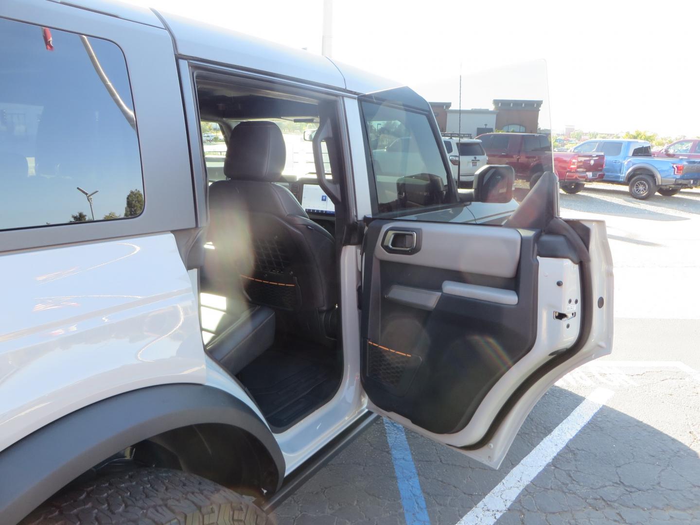 2023 Gray /BLACK Ford Bronco Badlands 4-Door w/Advanced (1FMEE5DP1PL) with an 2.7L V6 DOHC 24V engine, 7M transmission, located at 2630 Grass Valley Highway, Auburn, CA, 95603, (530) 508-5100, 38.937893, -121.095482 - Features a Zone offroad 1" level kit, 17" American Racing Baja wheels, 35" BFG KO2 tires, window tint, RC spare tire relocation & 3rd brake light extension. - Photo#43