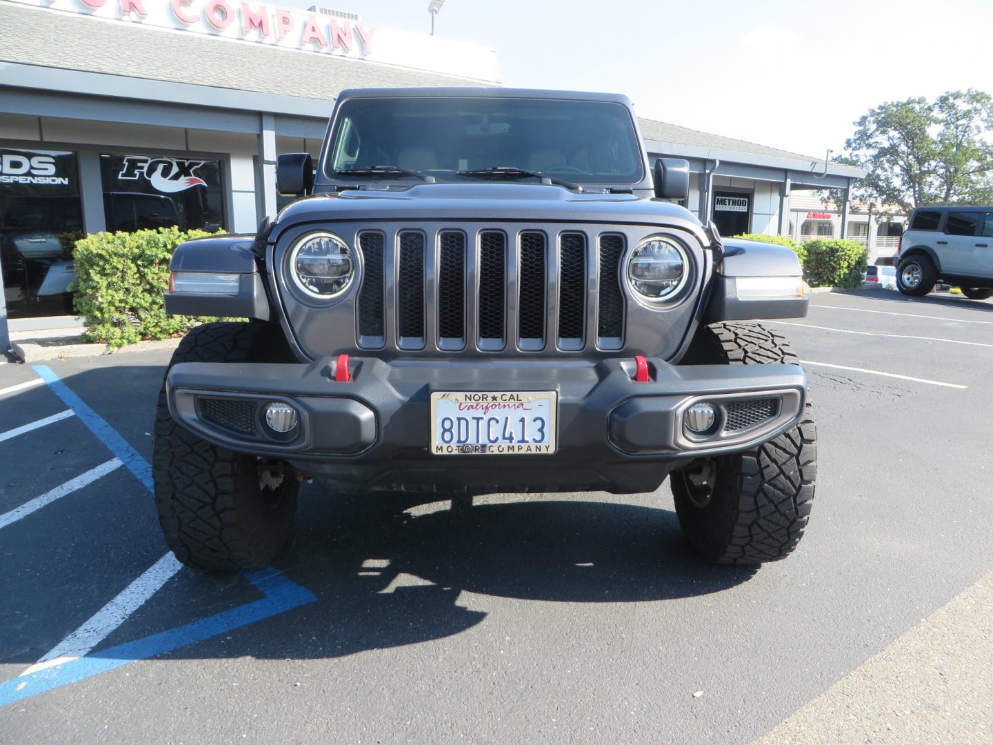 2018 CHARCOAL /TAN Jeep Wrangler JL Unlimited Rubicon (1C4HJXFG4JW) with an 3.6L V6 DOHC 24V FFV engine, 6A transmission, located at 2630 Grass Valley Highway, Auburn, CA, 95603, (530) 508-5100, 38.937893, -121.095482 - Must see Jeep with Fox shocks, Raceline wheels, Nitto Ridge Grappler tires, Dual Exhaust, and window tint. - Photo#1