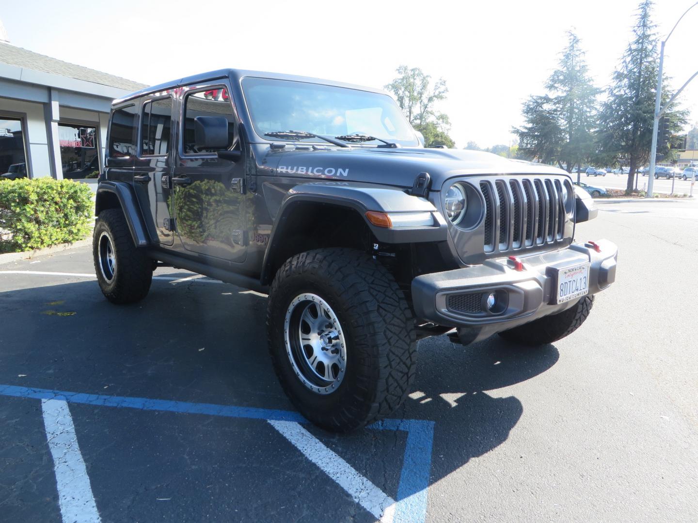 2018 CHARCOAL /TAN Jeep Wrangler JL Unlimited Rubicon (1C4HJXFG4JW) with an 3.6L V6 DOHC 24V FFV engine, 6A transmission, located at 2630 Grass Valley Highway, Auburn, CA, 95603, (530) 508-5100, 38.937893, -121.095482 - Must see Jeep with Fox shocks, Raceline wheels, Nitto Ridge Grappler tires, Dual Exhaust, and window tint. - Photo#2