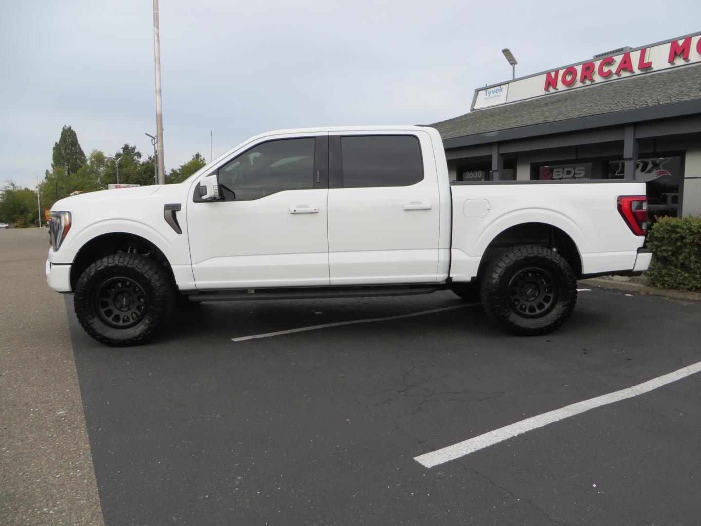 2022 White /black Ford F-150 Tremor SuperCrew 5.5-ft. Bed 4WD (1FTEW1E82NF) with an 3.5L V6 TURBO engine, 10 speed transmission, located at 2630 Grass Valley Highway, Auburn, CA, 95603, (530) 508-5100, 38.937893, -121.095482 - Tremor F150 Featuring an Icon Vehicle Dynamics stage 4 suspension system, 17" Method NV doubl eblack wheels, Nitto Ridge Grappler tires, Bakflip MX4, window tint, and custom paint to eliminate the Tremor orange and blue Ford emblems. - Photo#7