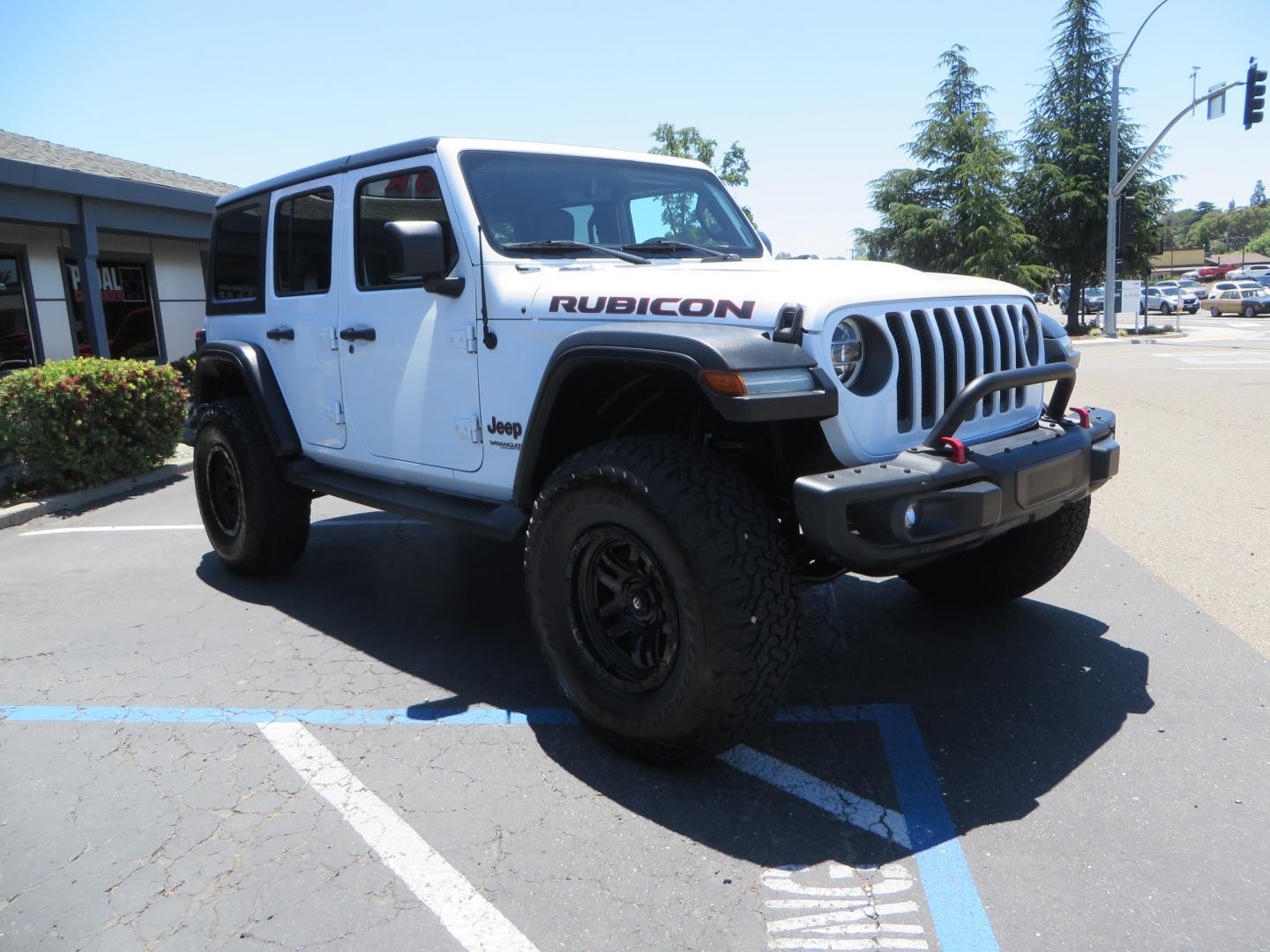 2018 White /black Jeep Wrangler JK Unlimited Rubicon 4WD (1C4HJXFGXJW) with an 3.6L V6 engine, Manual 6 speed transmission, located at 2630 Grass Valley Highway, Auburn, CA, 95603, (530) 508-5100, 38.937893, -121.095482 - Features - Zone Offroad 3" suspension system, Fox Adventure series shocks, 37" BFG KO2 tires, Fuel Ammo wheels, and a Teraflex spare tire relocation. - Photo#2