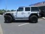 2018 White /black Jeep Wrangler JK Unlimited Rubicon 4WD (1C4HJXFGXJW) with an 3.6L V6 engine, Manual 6 speed transmission, located at 2630 Grass Valley Highway, Auburn, CA, 95603, (530) 508-5100, 38.937893, -121.095482 - Features - Zone Offroad 3" suspension system, Fox Adventure series shocks, 37" BFG KO2 tires, Fuel Ammo wheels, and a Teraflex spare tire relocation. - Photo#7