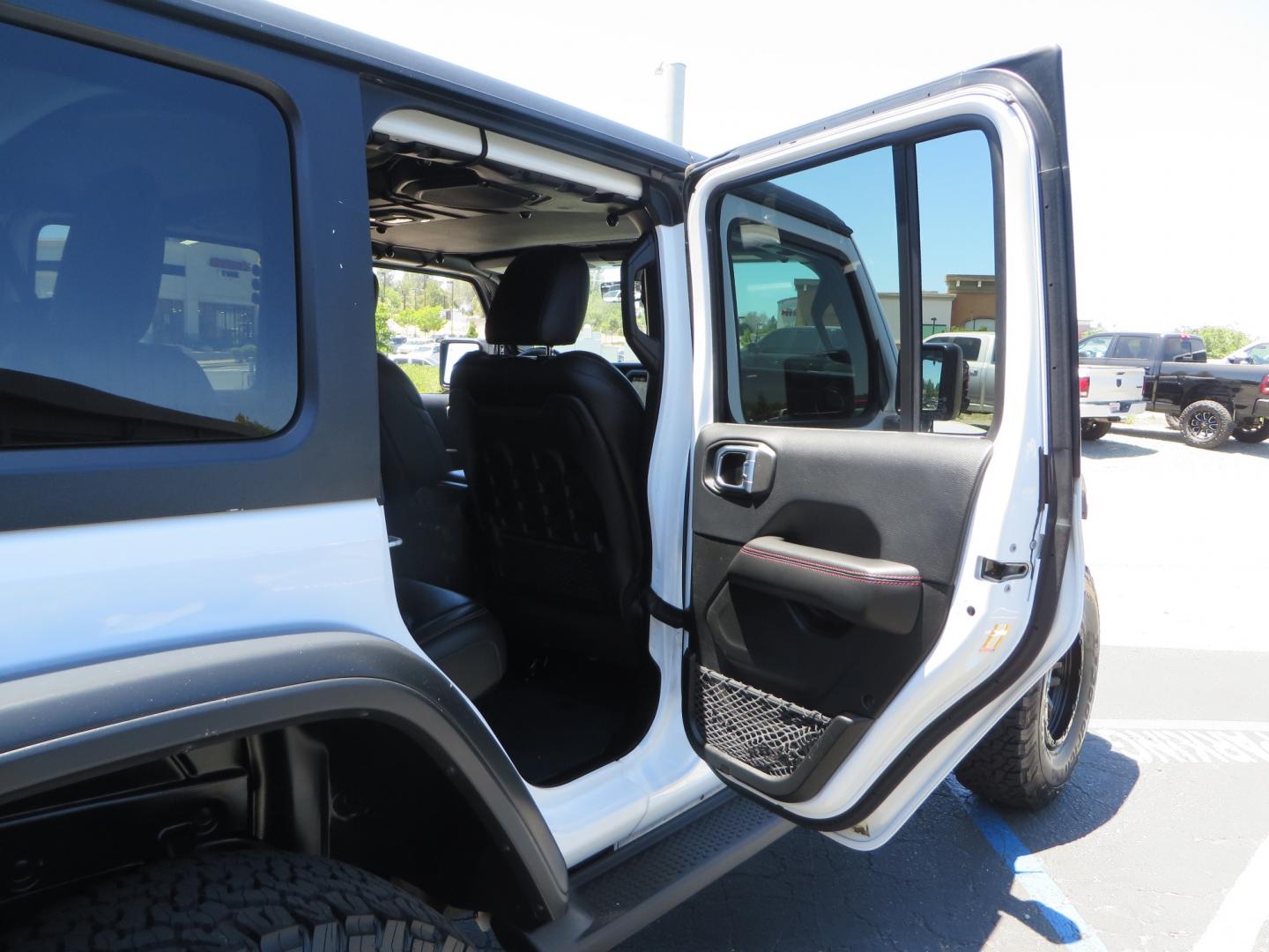 2018 White /black Jeep Wrangler JK Unlimited Rubicon 4WD (1C4HJXFGXJW) with an 3.6L V6 engine, Manual 6 speed transmission, located at 2630 Grass Valley Highway, Auburn, CA, 95603, (530) 508-5100, 38.937893, -121.095482 - Features - Zone Offroad 3" suspension system, Fox Adventure series shocks, 37" BFG KO2 tires, Fuel Ammo wheels, and a Teraflex spare tire relocation. - Photo#52