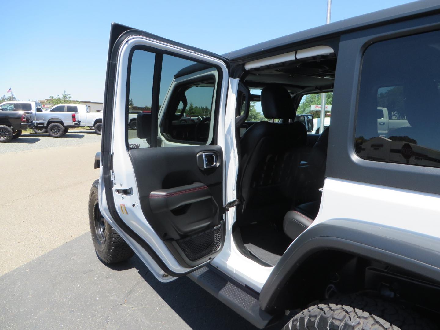 2018 White /black Jeep Wrangler JK Unlimited Rubicon 4WD (1C4HJXFGXJW) with an 3.6L V6 engine, Manual 6 speed transmission, located at 2630 Grass Valley Highway, Auburn, CA, 95603, (530) 508-5100, 38.937893, -121.095482 - Features - Zone Offroad 3" suspension system, Fox Adventure series shocks, 37" BFG KO2 tires, Fuel Ammo wheels, and a Teraflex spare tire relocation. - Photo#37