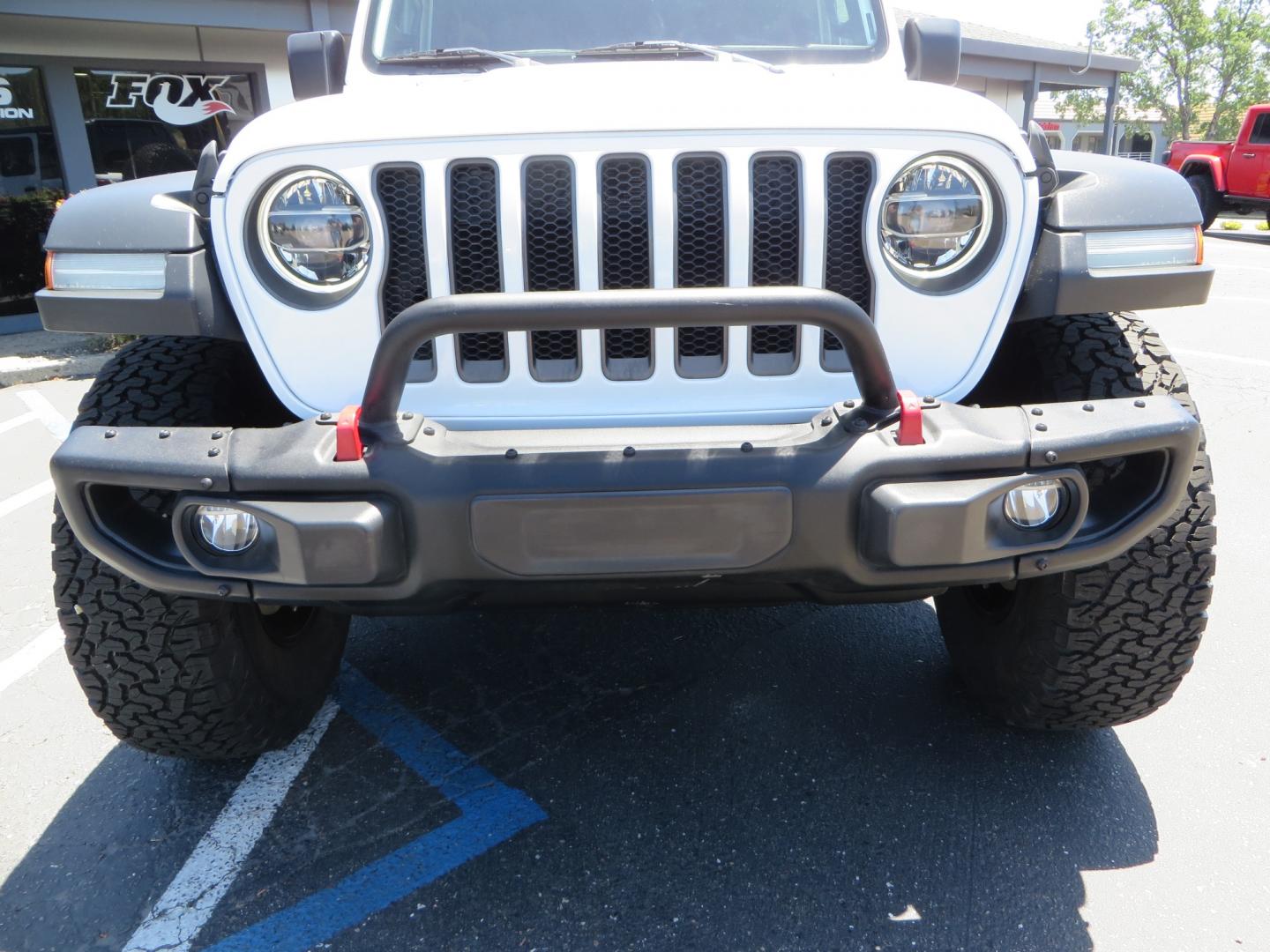 2018 White /black Jeep Wrangler JK Unlimited Rubicon 4WD (1C4HJXFGXJW) with an 3.6L V6 engine, Manual 6 speed transmission, located at 2630 Grass Valley Highway, Auburn, CA, 95603, (530) 508-5100, 38.937893, -121.095482 - Features - Zone Offroad 3" suspension system, Fox Adventure series shocks, 37" BFG KO2 tires, Fuel Ammo wheels, and a Teraflex spare tire relocation. - Photo#10