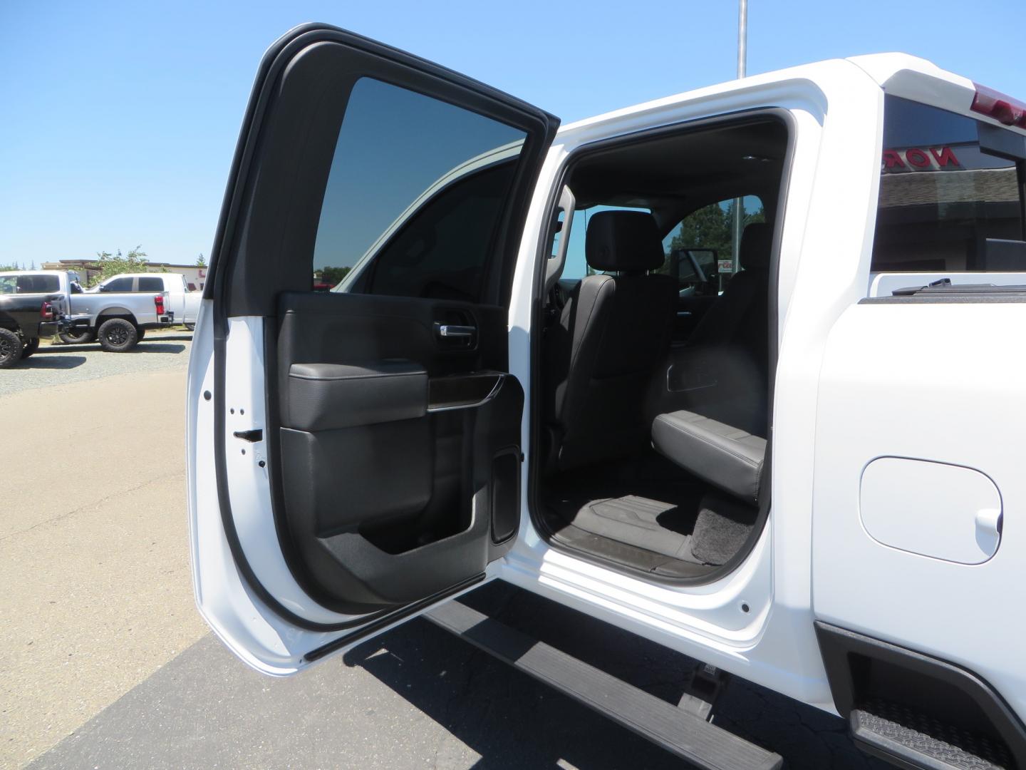 2021 White /black GMC Sierra 3500HD Denali (1GT49WEYXMF) with an 6.6L V8 TURBO DIESEL engine, automatic transmission, located at 2630 Grass Valley Highway, Auburn, CA, 95603, (530) 508-5100, 38.937893, -121.095482 - Must see Duramax with a ton of extras.... Cognito Suspension, Fox 2.0 remote reservoir shocks, 37" Nitto Recon Grappler tires, 20" Fuel Covert wheels, Sintor front and rear bumpers, Rigid LED lighting, Bakflip MX4, Gen Y hitch, Bolt locks, Amp Power steps, Window Tint, Sintor side badges, Smoked mar - Photo#43