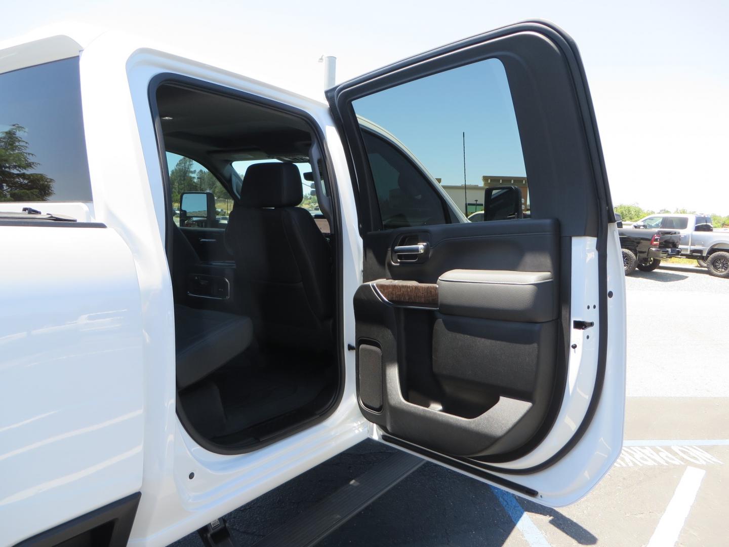 2021 White /black GMC Sierra 3500HD Denali (1GT49WEYXMF) with an 6.6L V8 TURBO DIESEL engine, automatic transmission, located at 2630 Grass Valley Highway, Auburn, CA, 95603, (530) 508-5100, 38.937893, -121.095482 - Must see Duramax with a ton of extras.... Cognito Suspension, Fox 2.0 remote reservoir shocks, 37" Nitto Recon Grappler tires, 20" Fuel Covert wheels, Sintor front and rear bumpers, Rigid LED lighting, Bakflip MX4, Gen Y hitch, Bolt locks, Amp Power steps, Window Tint, Sintor side badges, Smoked mar - Photo#58